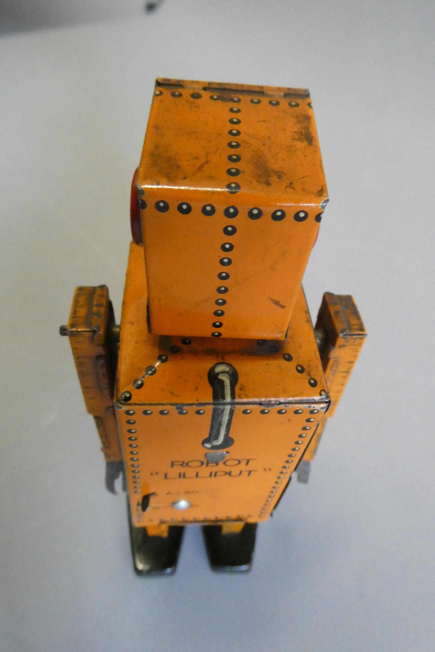 Rare KT toys Japan clockwork robot "Liliput" NP5357 finished in orange with printed detail. Tested Image