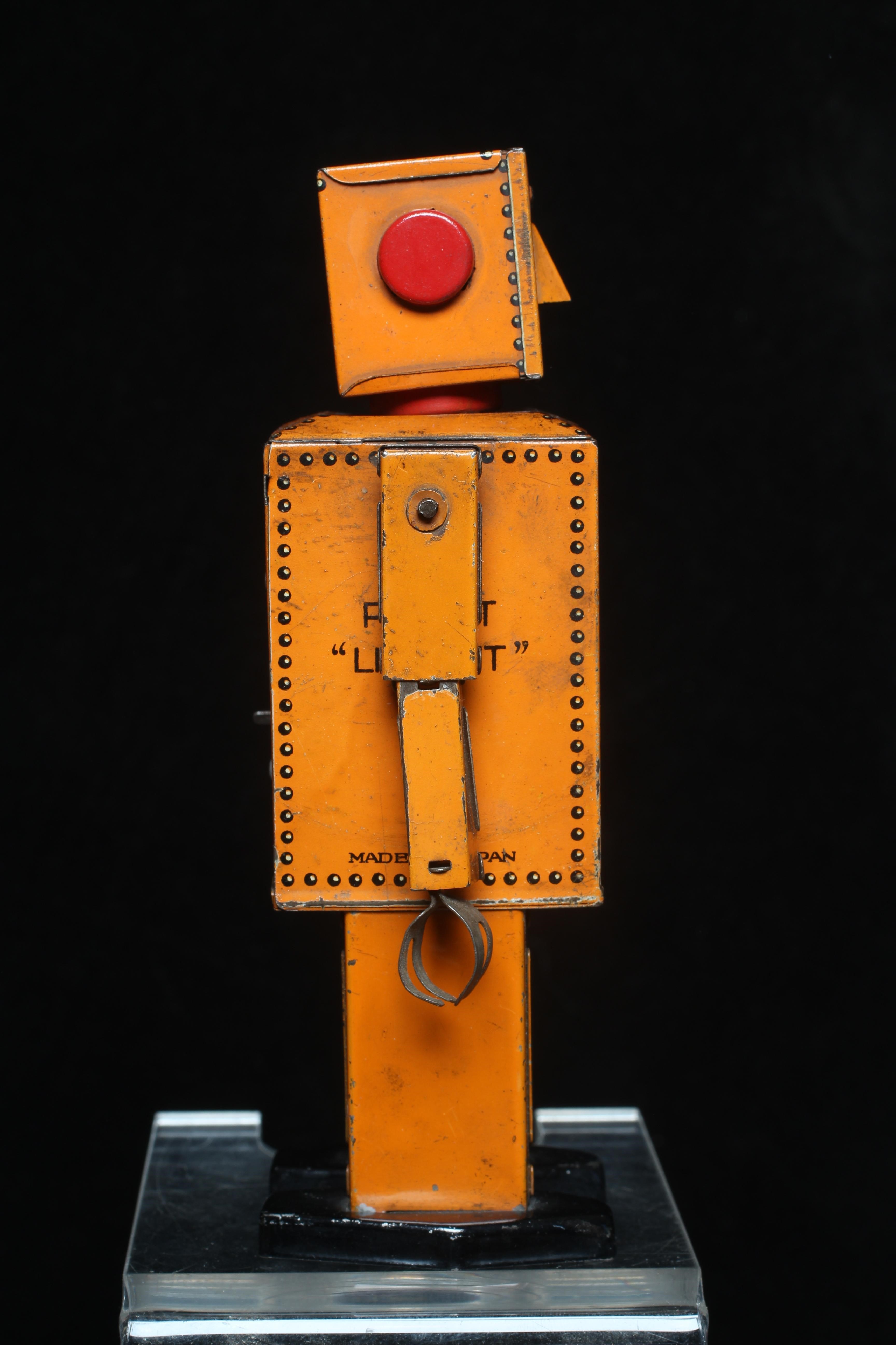 Rare KT toys Japan clockwork robot "Liliput" NP5357 finished in orange with printed detail. Tested Image
