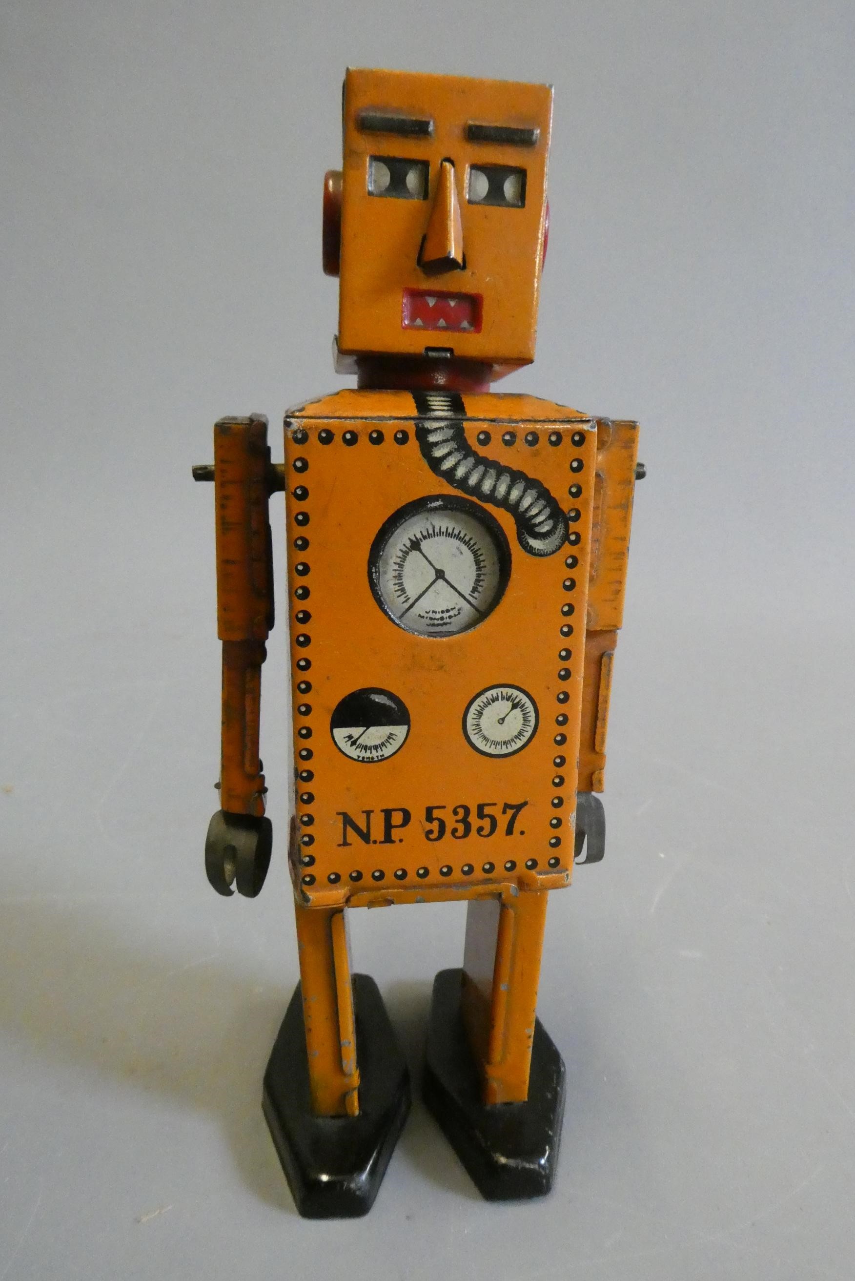 Rare KT toys Japan clockwork robot "Liliput" NP5357 finished in orange with printed detail. Tested Image