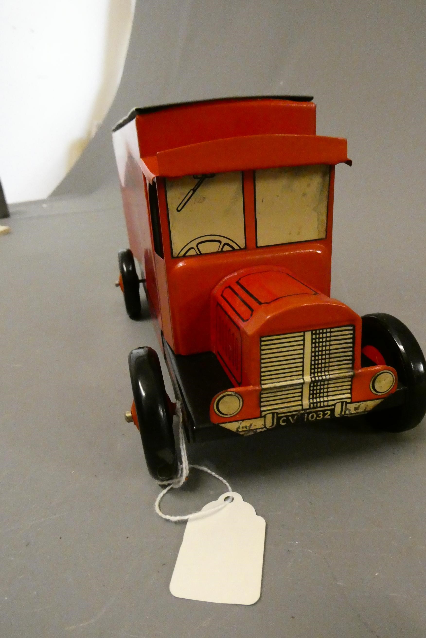 Chad Valley clockwork Royal Mail delivery van G.R.VI post early in the day to one side Image