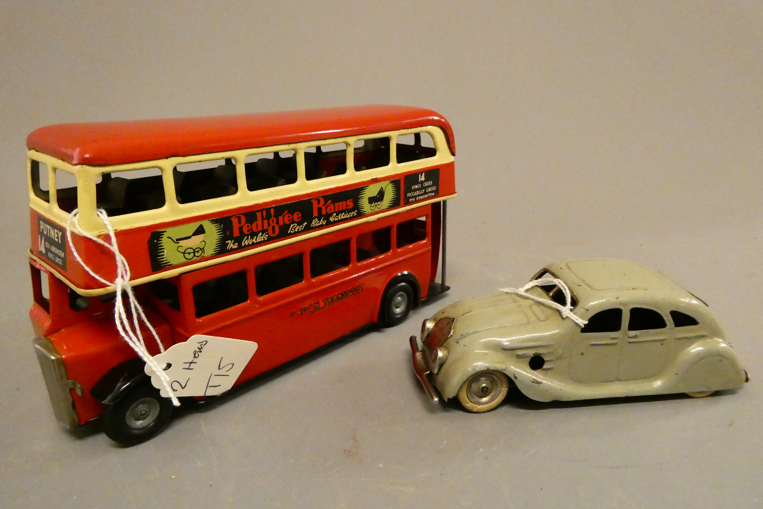 Triang Minic clockwork bus, some minor damage to transfers, otherwise good, and a grey Minic saloon Image