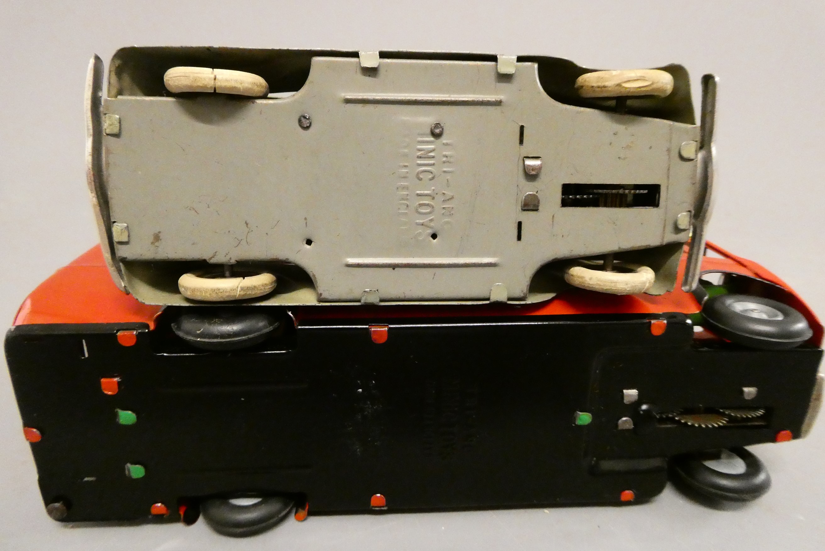 Triang Minic clockwork bus, some minor damage to transfers, otherwise good, and a grey Minic saloon Image