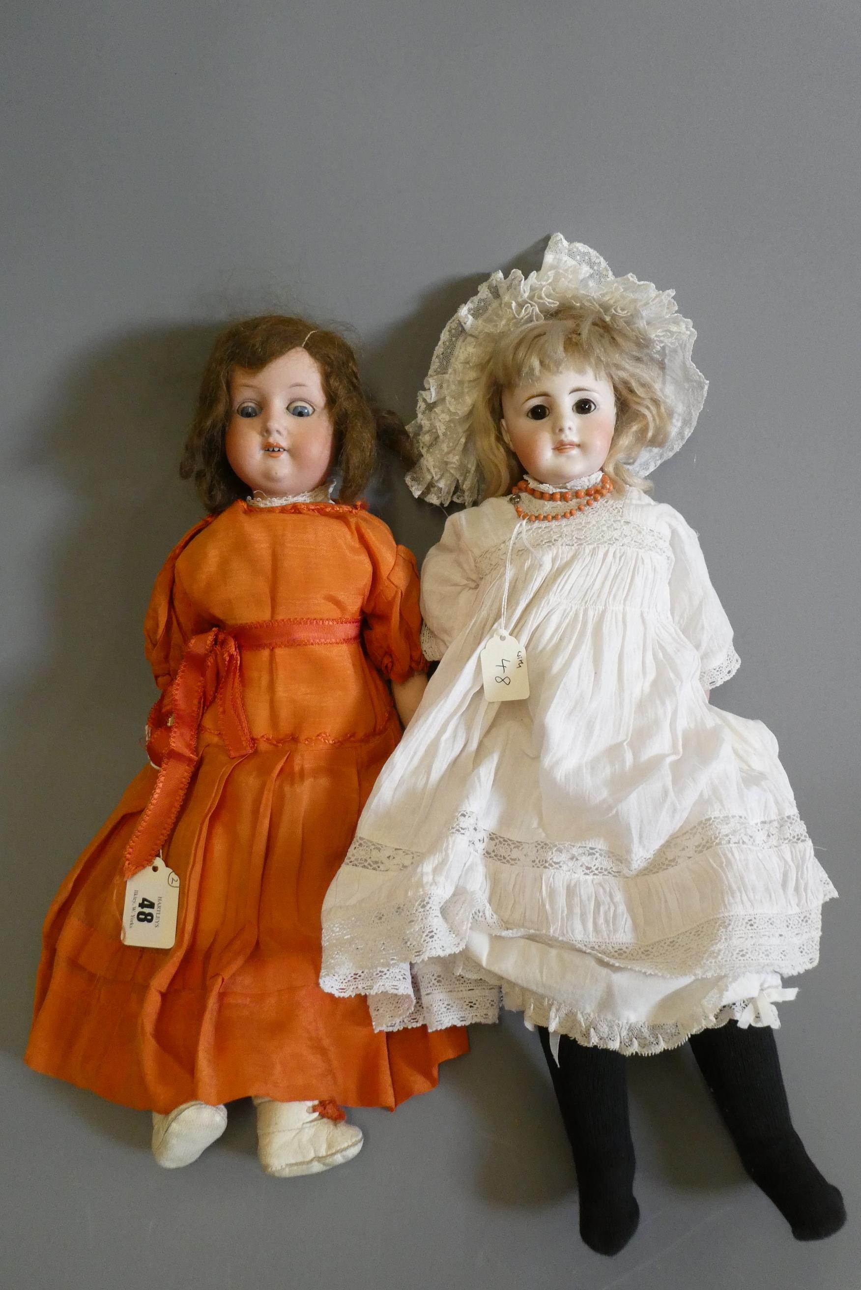 A Max Oscar Arnold bisque socket head doll with blue glass sleeping eyes Image