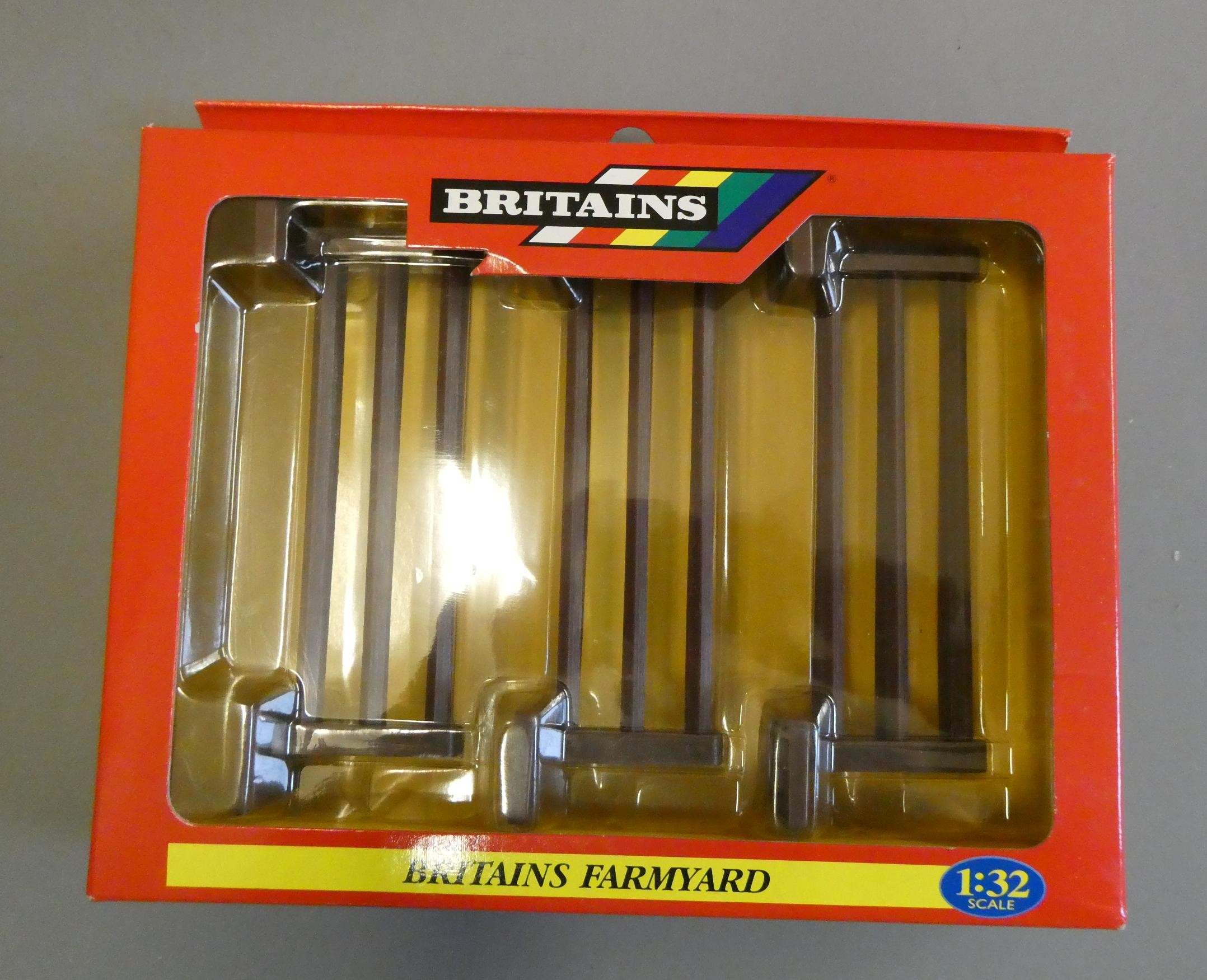 Unboxed playworn Britains farm accessories and a boxed set of fencing (Est. plus 24% buyer's premium Image