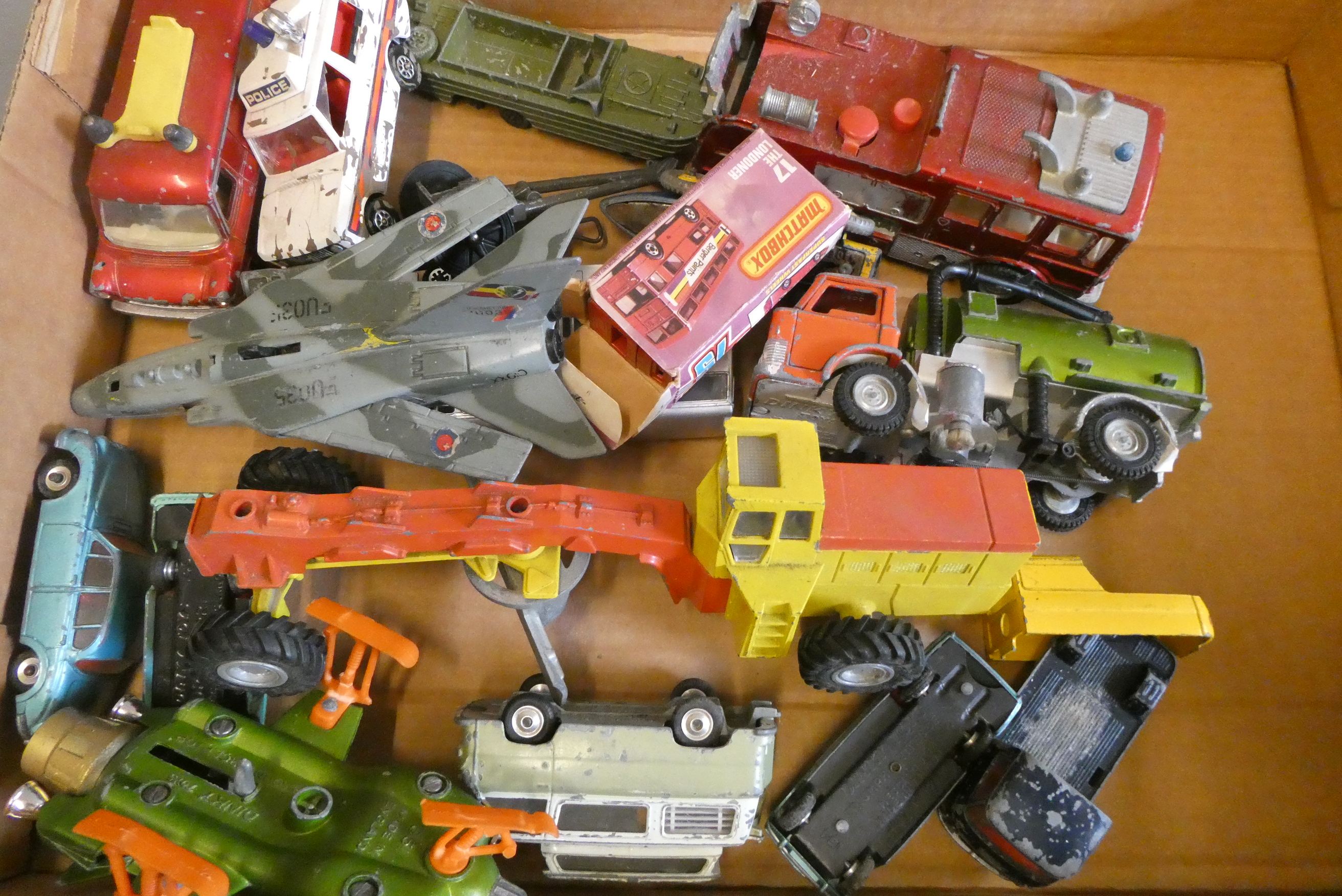 Mixed playworn diecast vehicles by Dinky, Matchbox and others including diggers, cars and vans. Poor Image