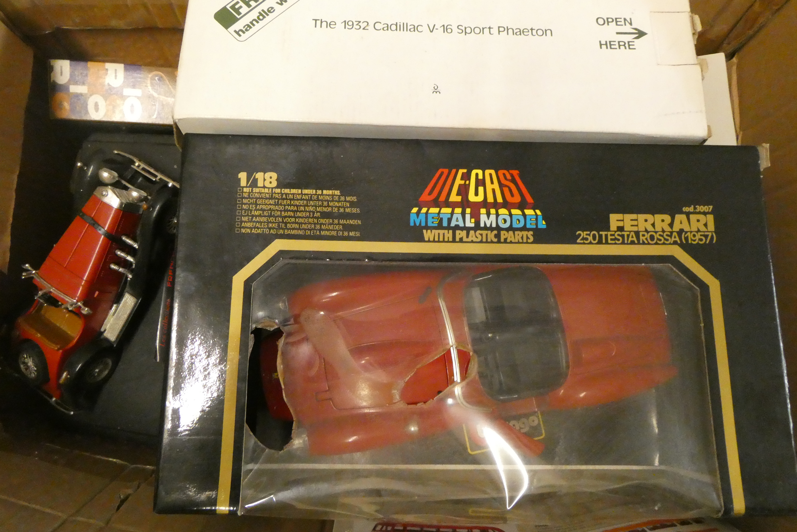 Diecast and plastic classic car model by Burago and other makers including Ferrari, Cadillac and Image