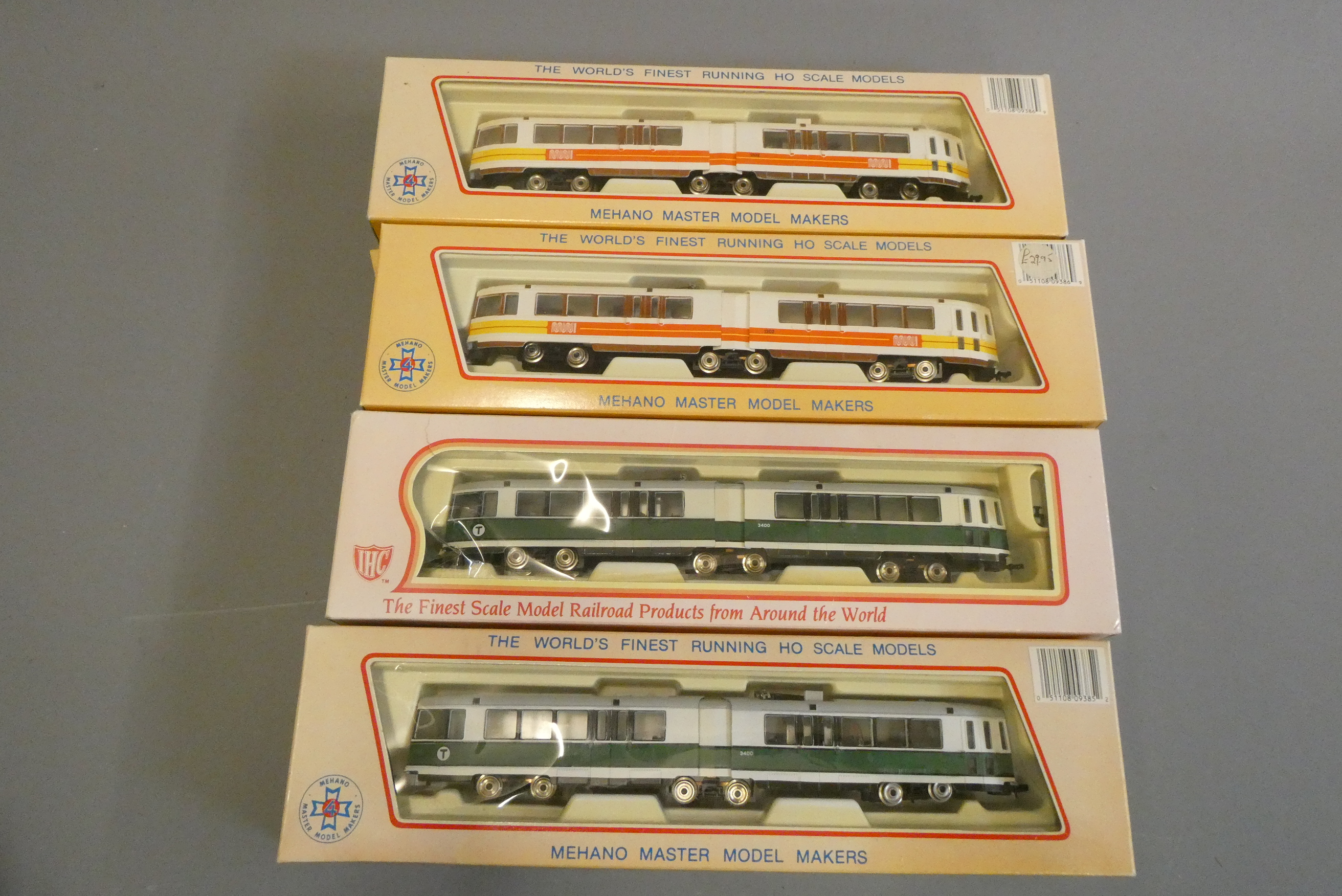 Four Mehano HO scale 12 volt 2-rail modern American trams, all items boxed, excellent (Est. plus 24% Image