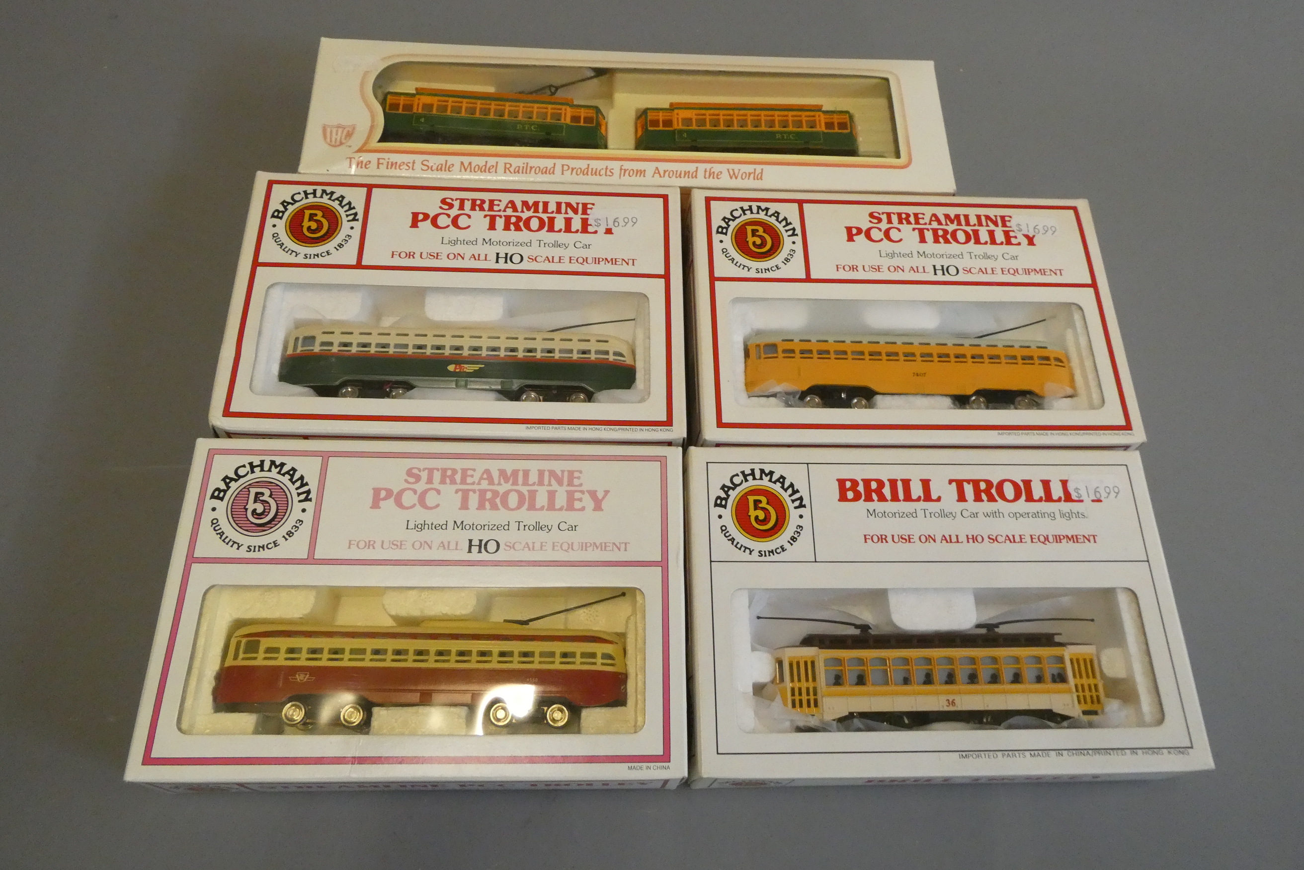 Five HO scale 12 volt 2-rail American trams by Bachmann and Mehano, all items boxed, excellent (Est. Image