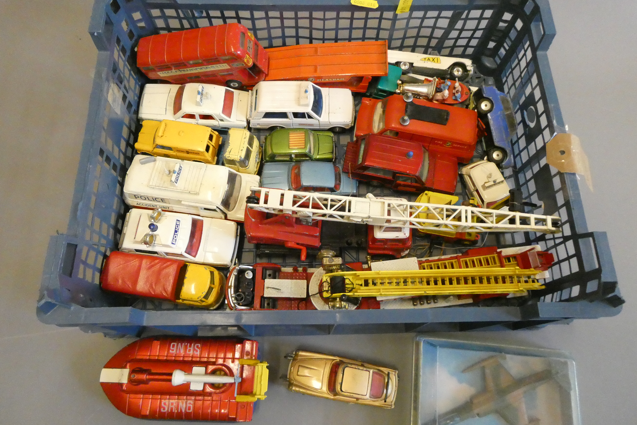 Unboxed diecast vehicles by Dinky, Corgi and others including fire engine, police cars and JB007 Image