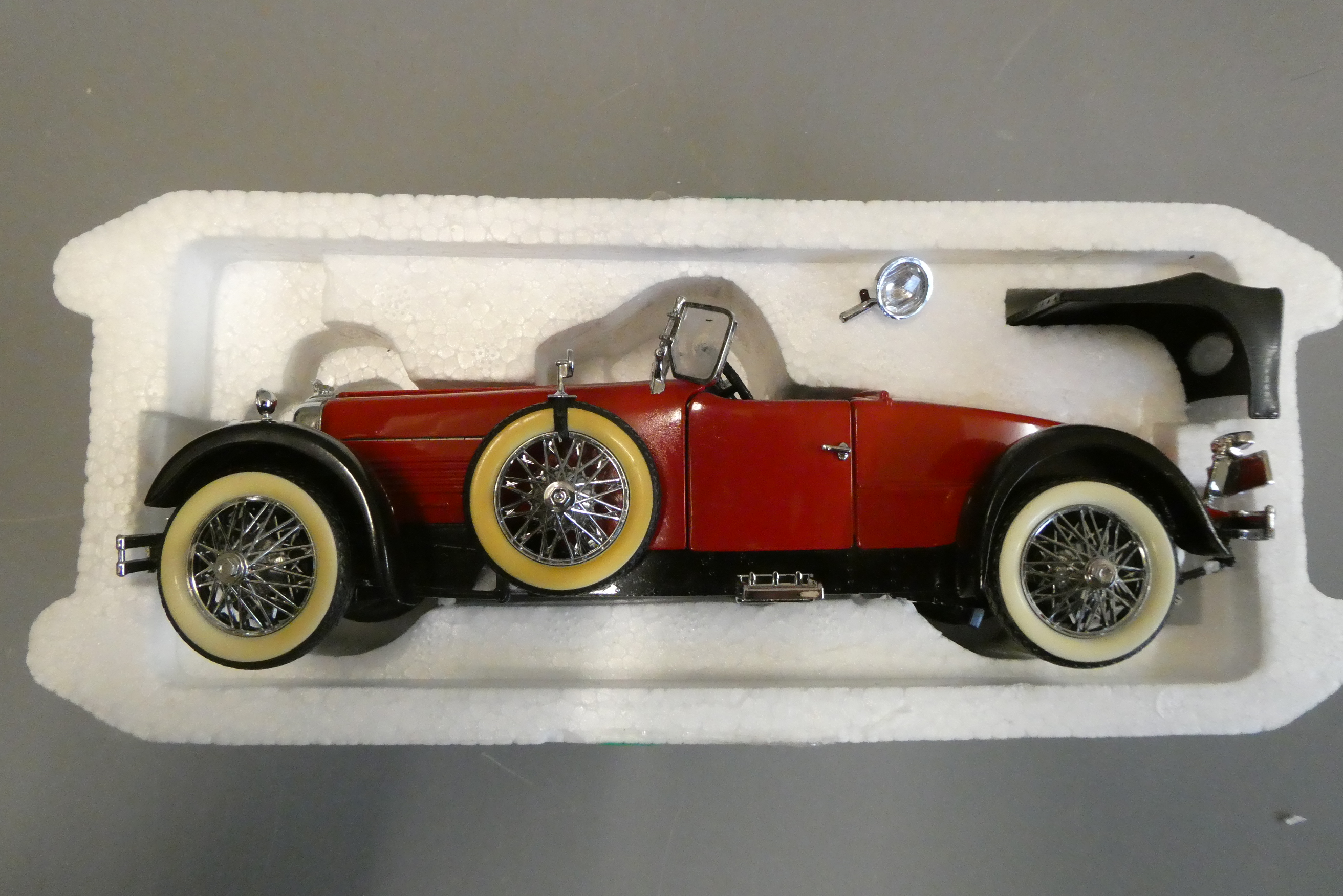 Franklin Mint 1:24 scale 1928 Stutz Boat Tail Speedster in red. Some minor paint blemishes, good+ Image