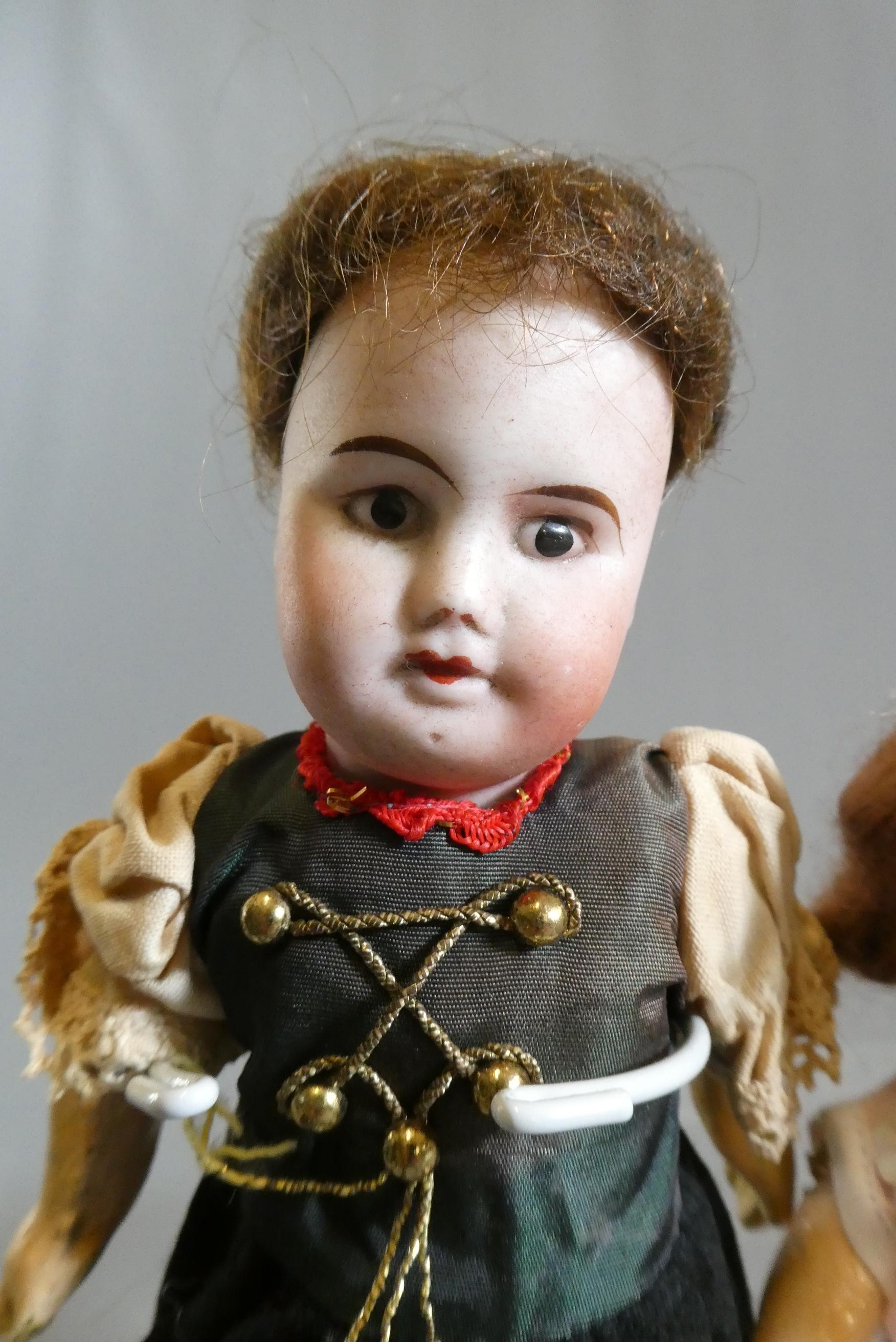 Two small SFBJ bisque socket head dolls Image