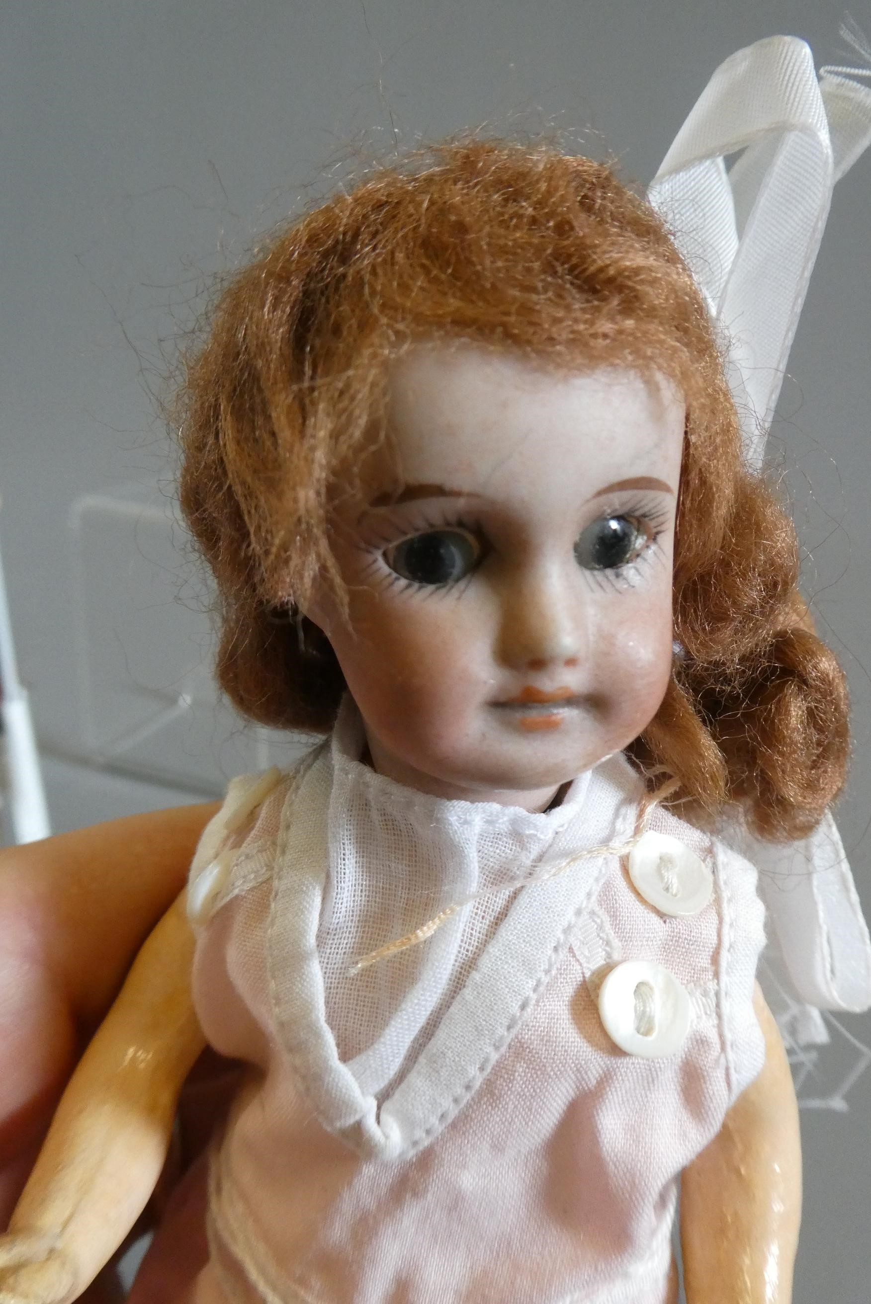 Two small SFBJ bisque socket head dolls Image