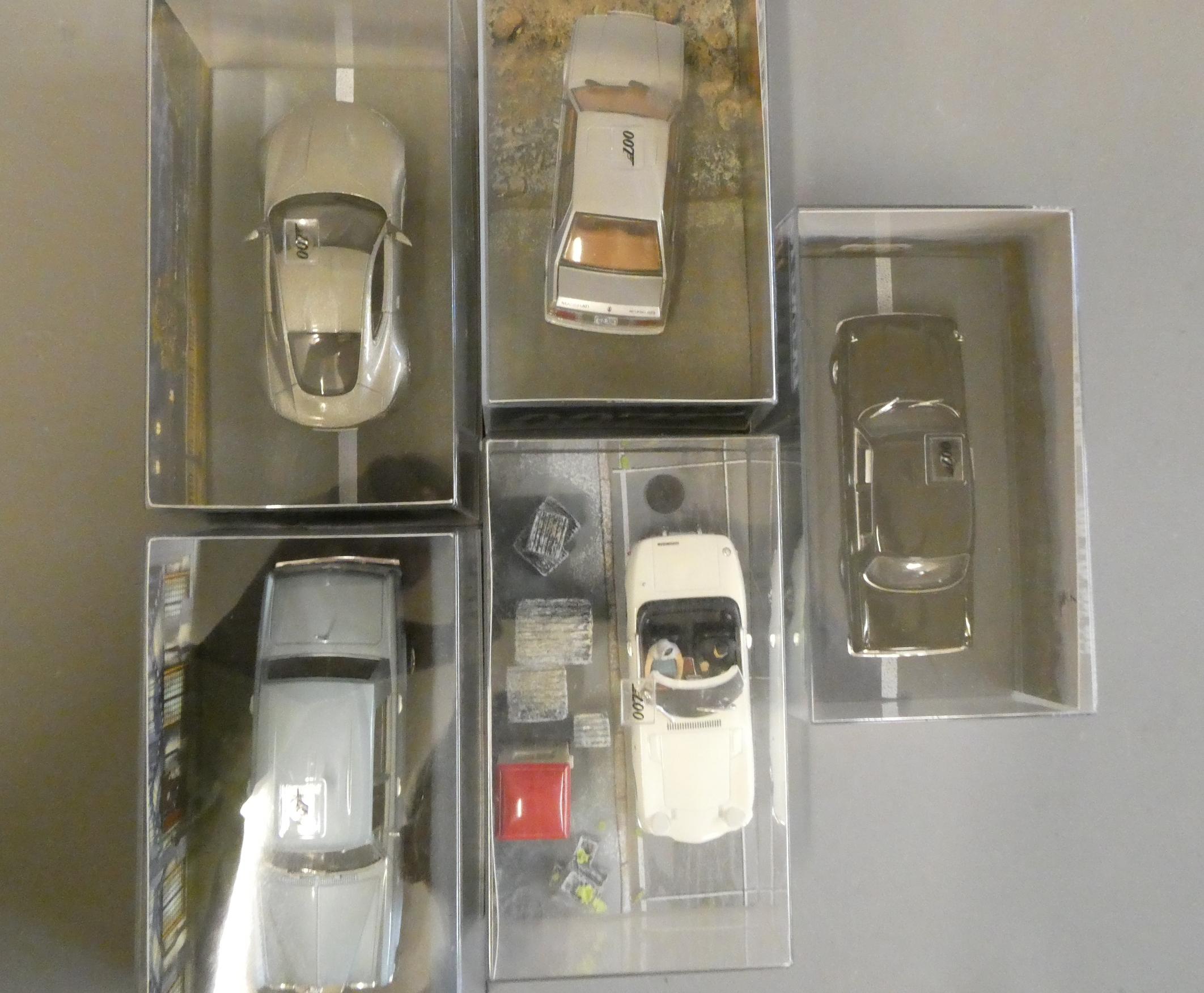 Five Eaglemoss James Bond vehicles comprising Toyota Crown Image