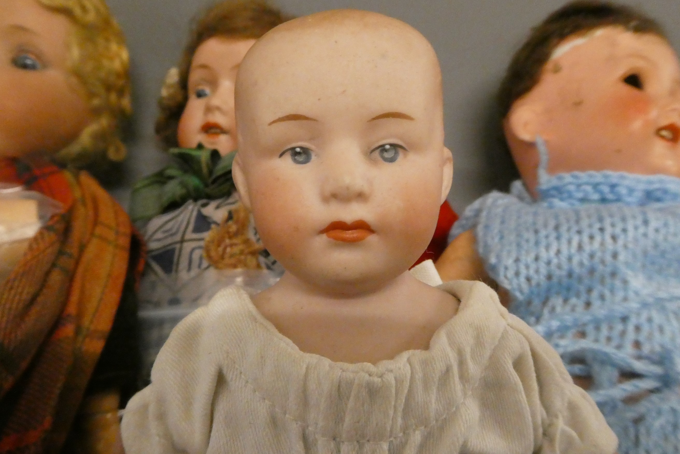 Five bisque head dolls Image