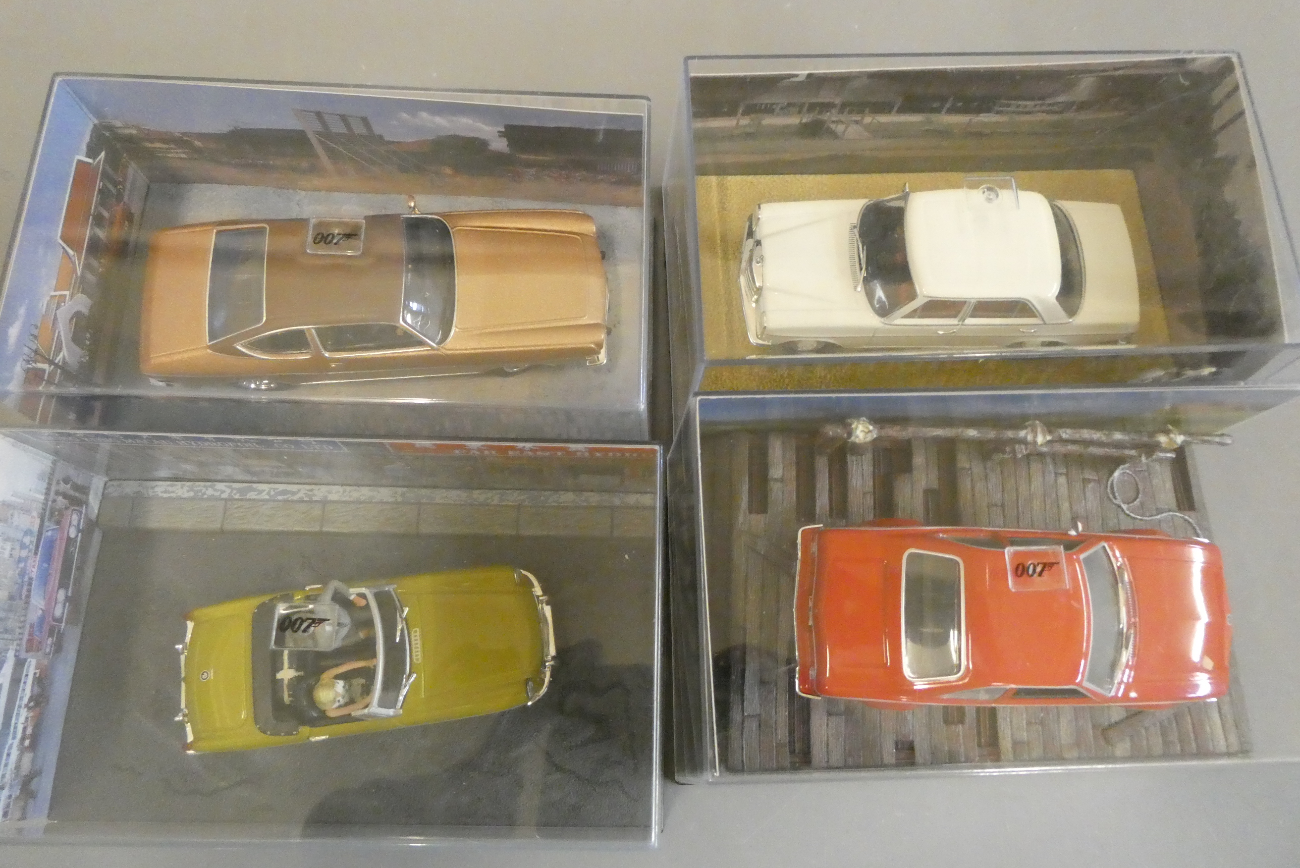 Four Fabbri James Bond The Man with the Golden Gun vehicles comprising MGB Mercedes 220, AMC Hornet Image