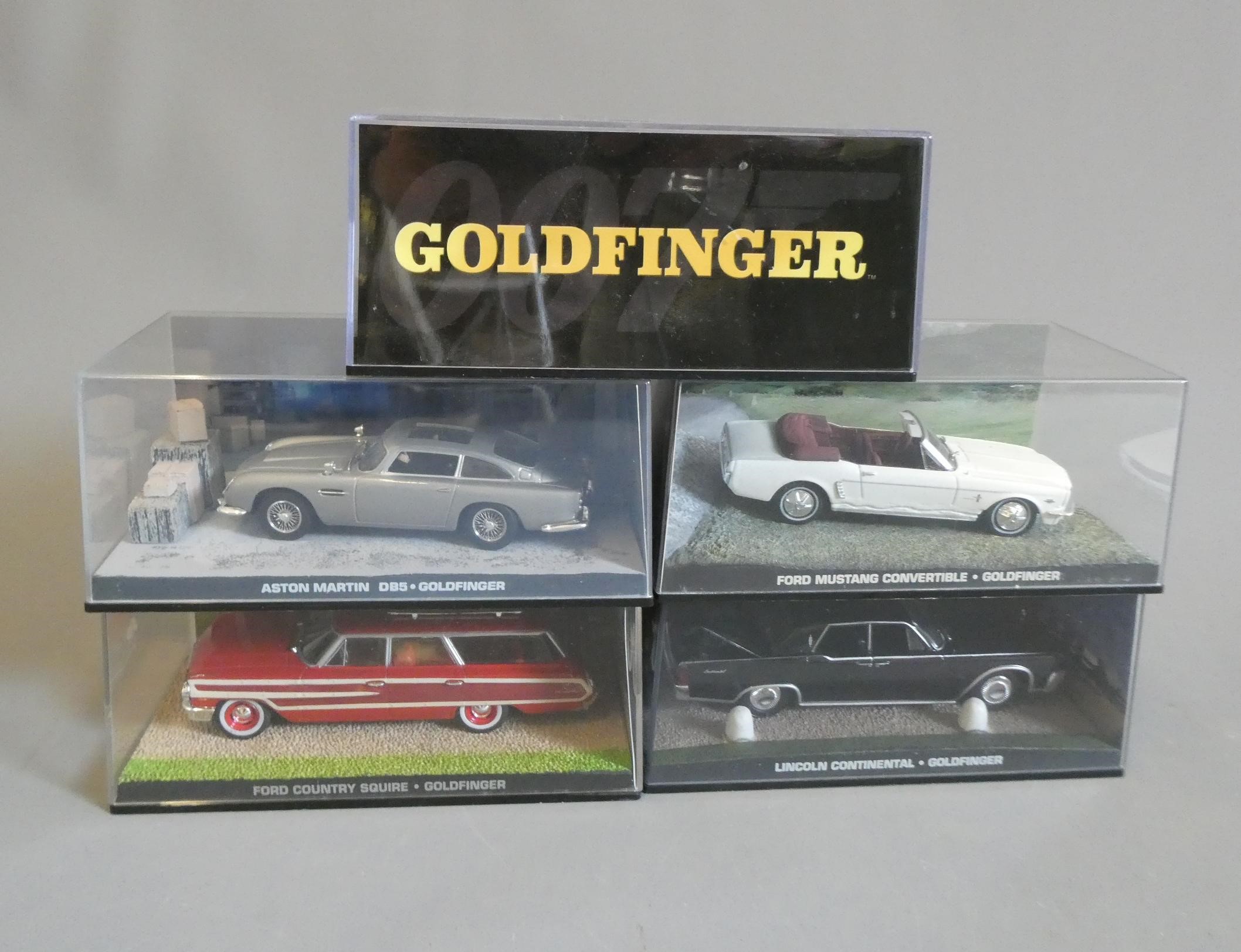 Five Fabbri James Bond Goldfinger vehicles comprising Image