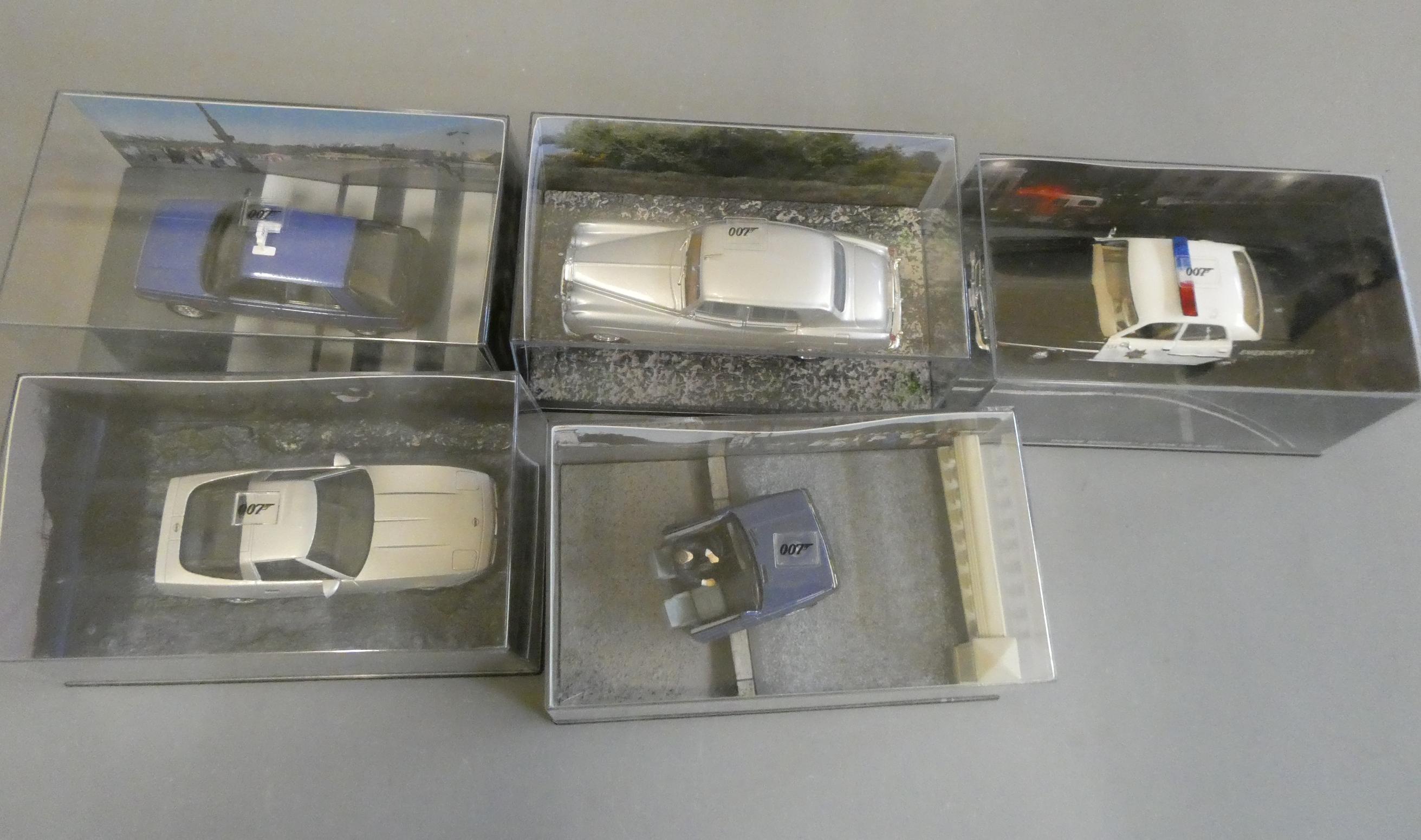 Five Fabbri James Bond vehicles comprising Touch, Rolls Royce Silver Cloud, Renault 11 and Chevrolet Image