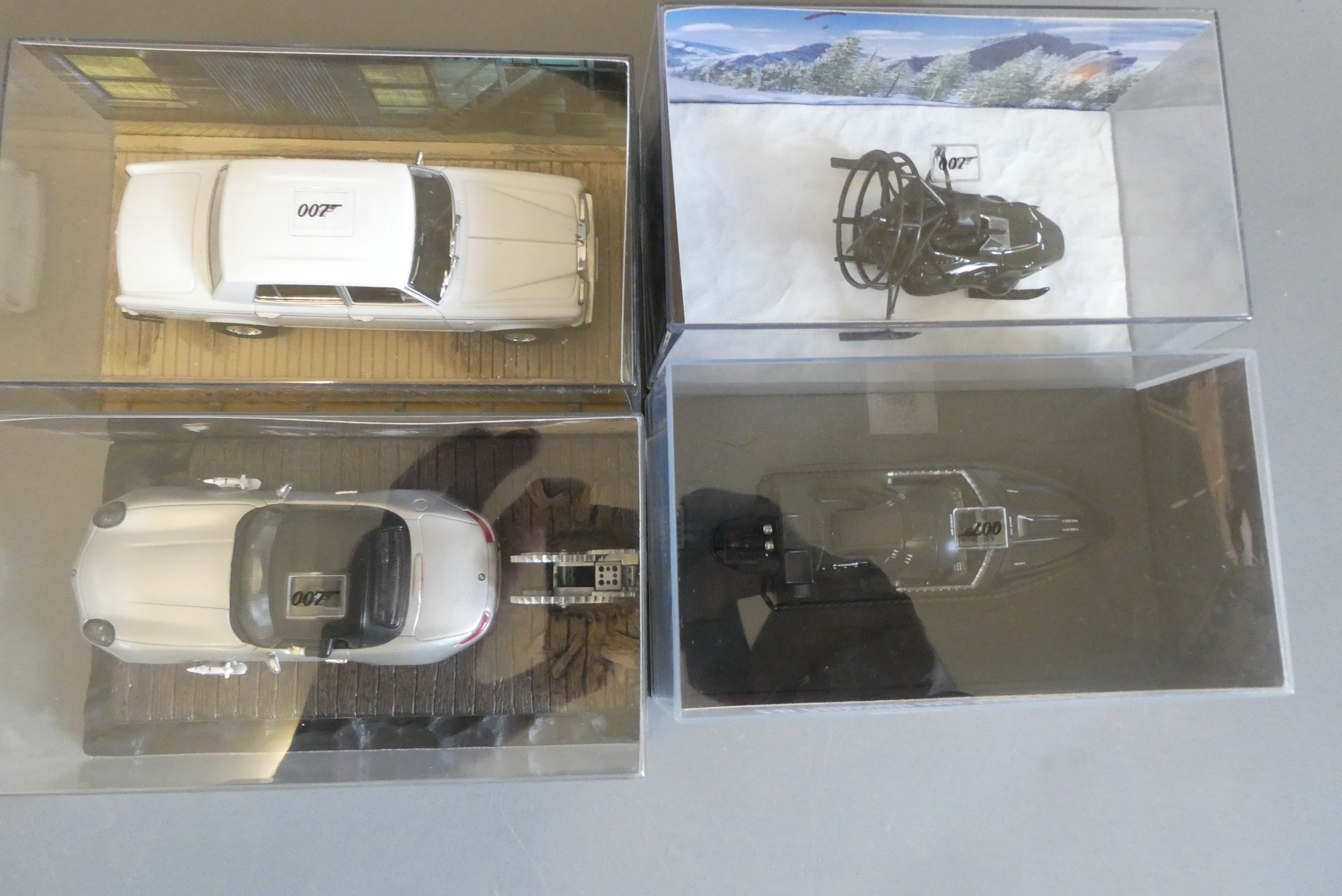 Four Fabbri James Bond The World Is Not Enough vehicles comprising Q Boat, Rolls Royce Silver Image