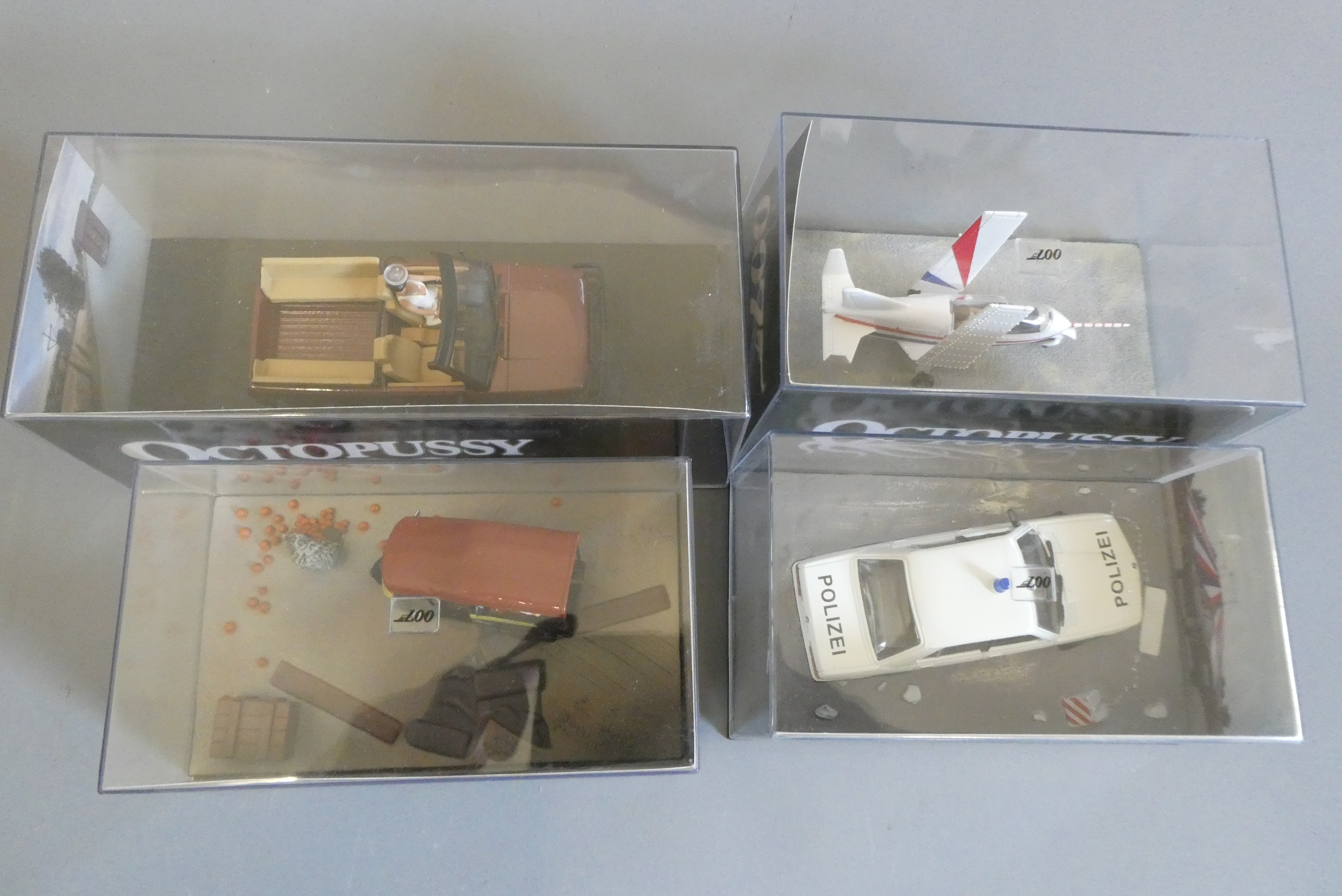 Four Fabbri James Bond Octopussy vehicles comprising Range Rover convertible, tuck-tuck vehicle, BMW Image