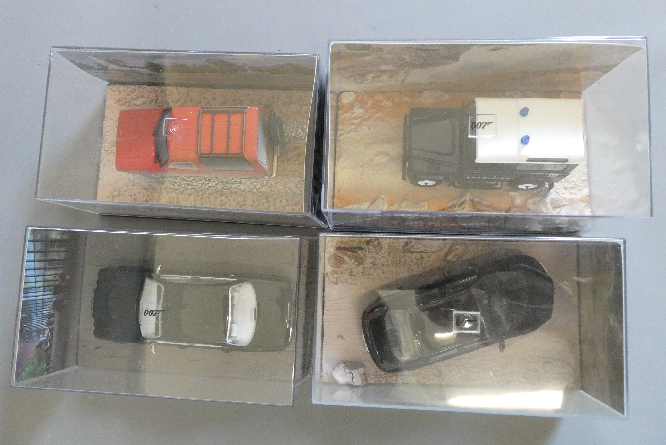 Four Fabbri James Bond Quantum of Solace vehicles comprising Daimler Super 8, Ford Bronco and Land Image