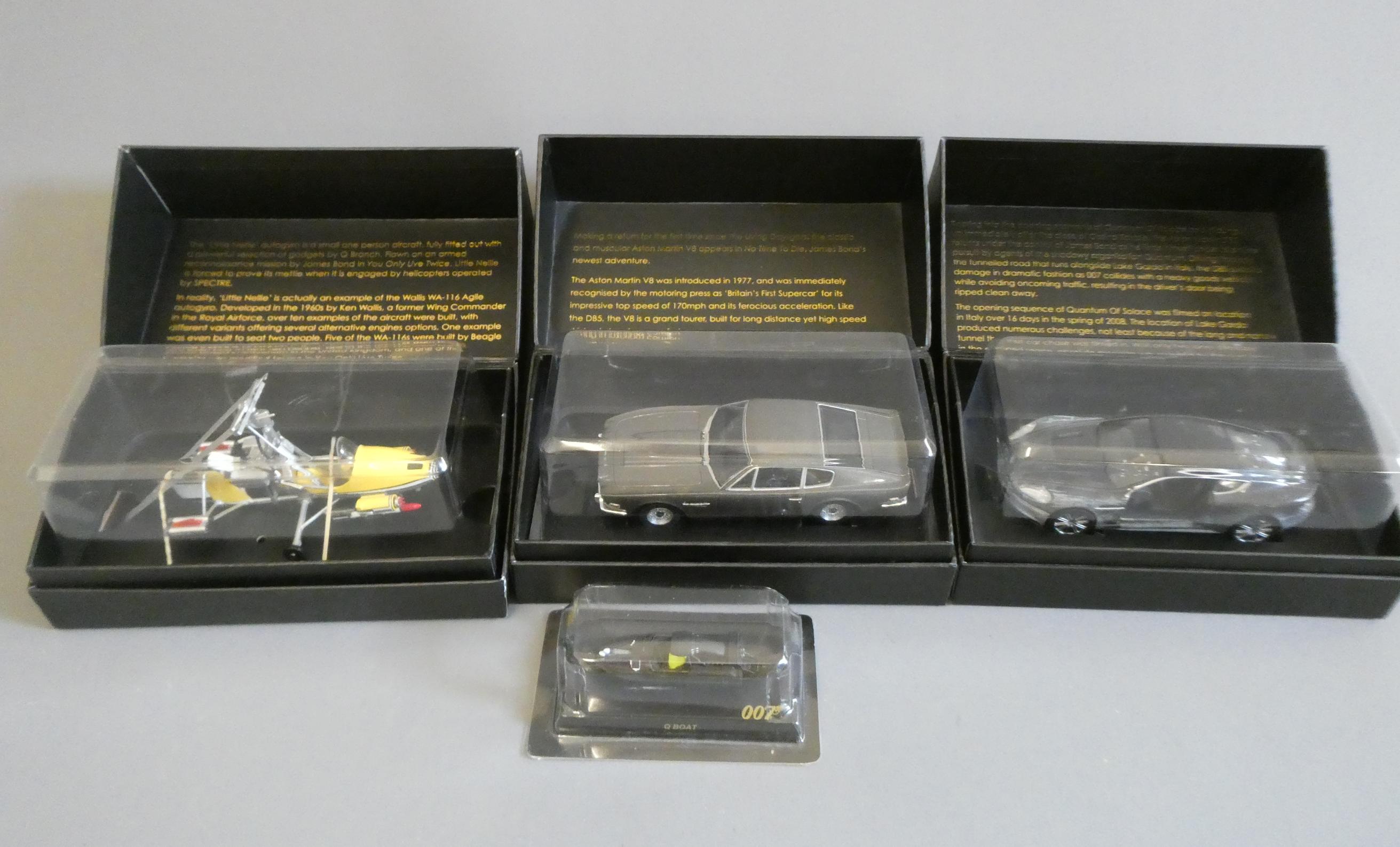 Four Corgi James Bond vehicles comprising Q boat, Aston Martin V8, Aston Martin DBS and little Nelle Image
