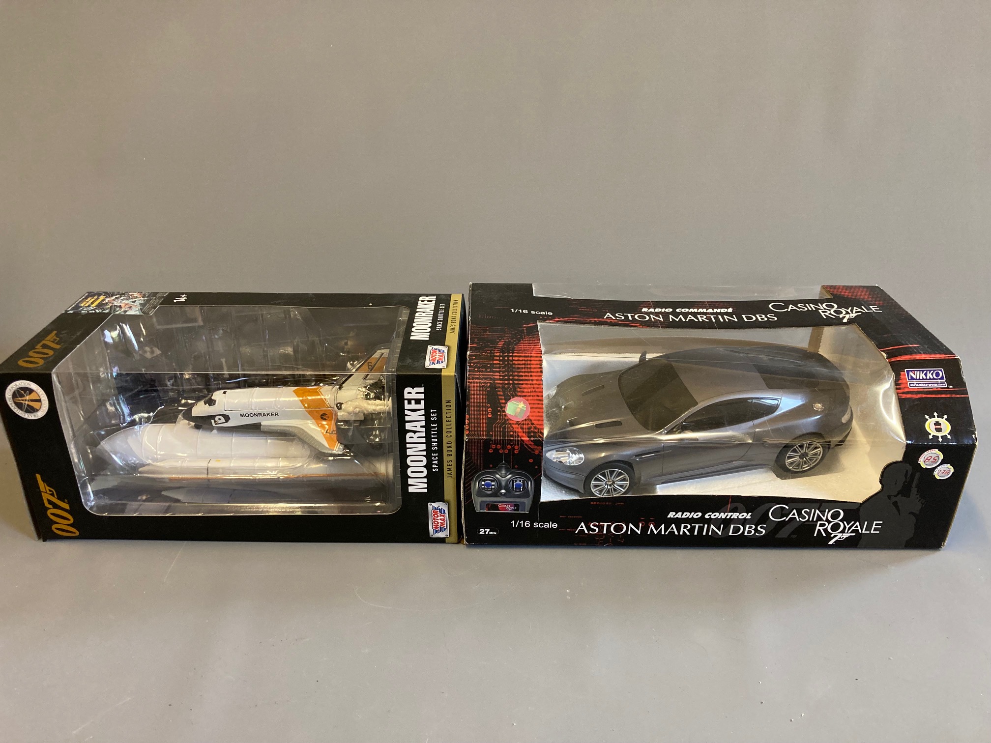 Motomax Moonraker Space Shuttle and Nikko radio-controlled Casino Royale Aston Martin DBS, both Image
