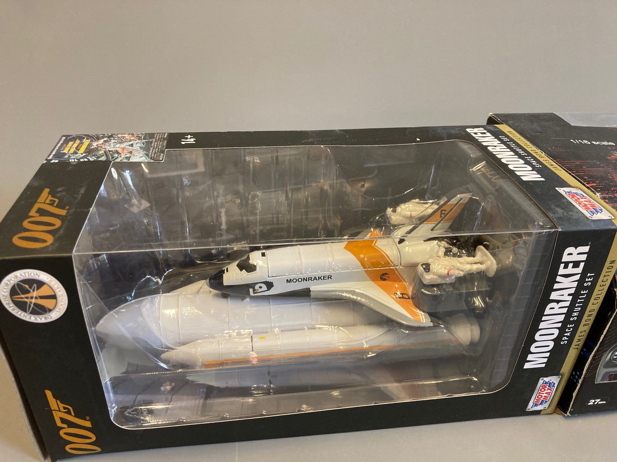 Motomax Moonraker Space Shuttle and Nikko radio-controlled Casino Royale Aston Martin DBS, both Image
