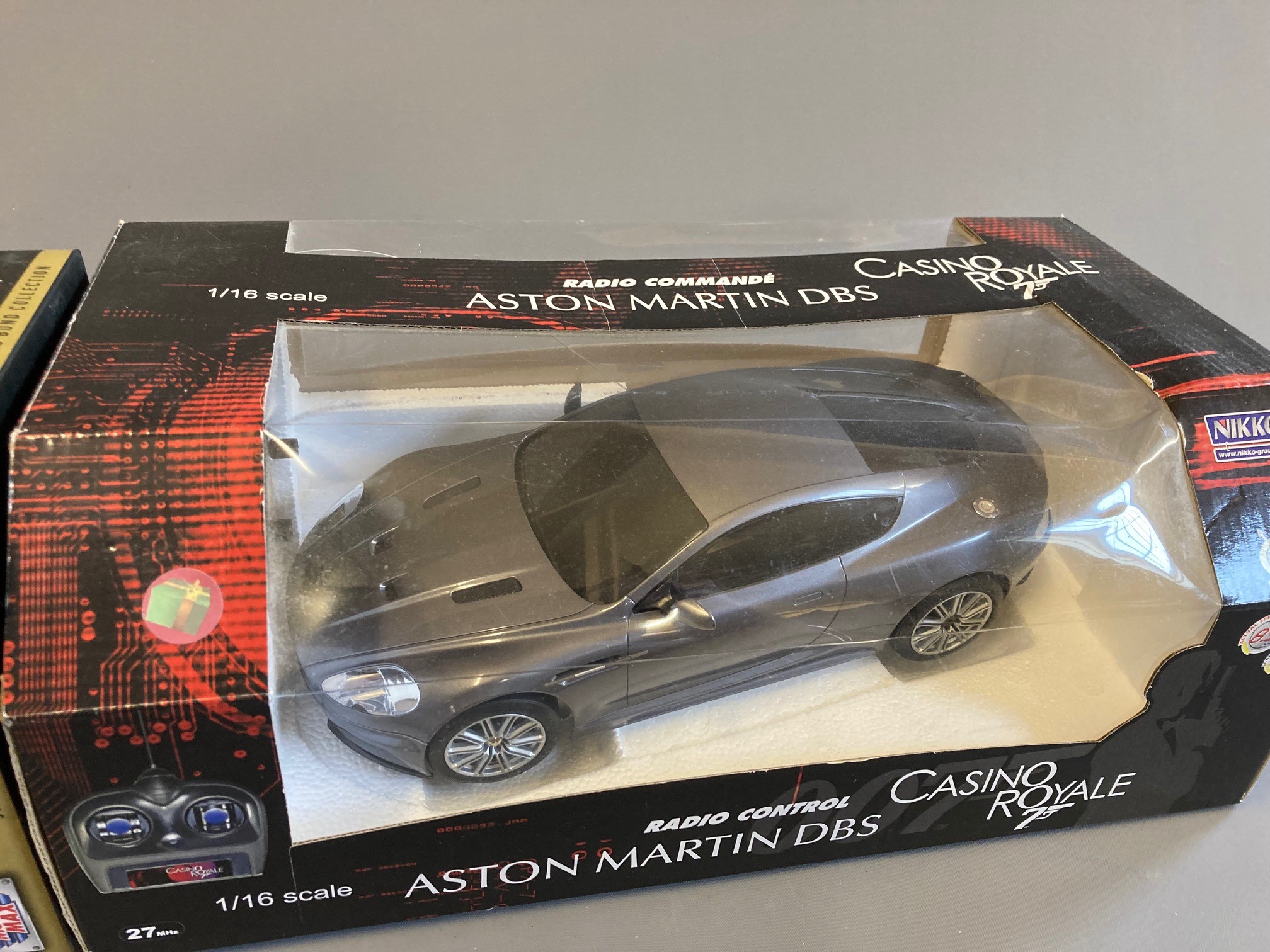 Motomax Moonraker Space Shuttle and Nikko radio-controlled Casino Royale Aston Martin DBS, both Image