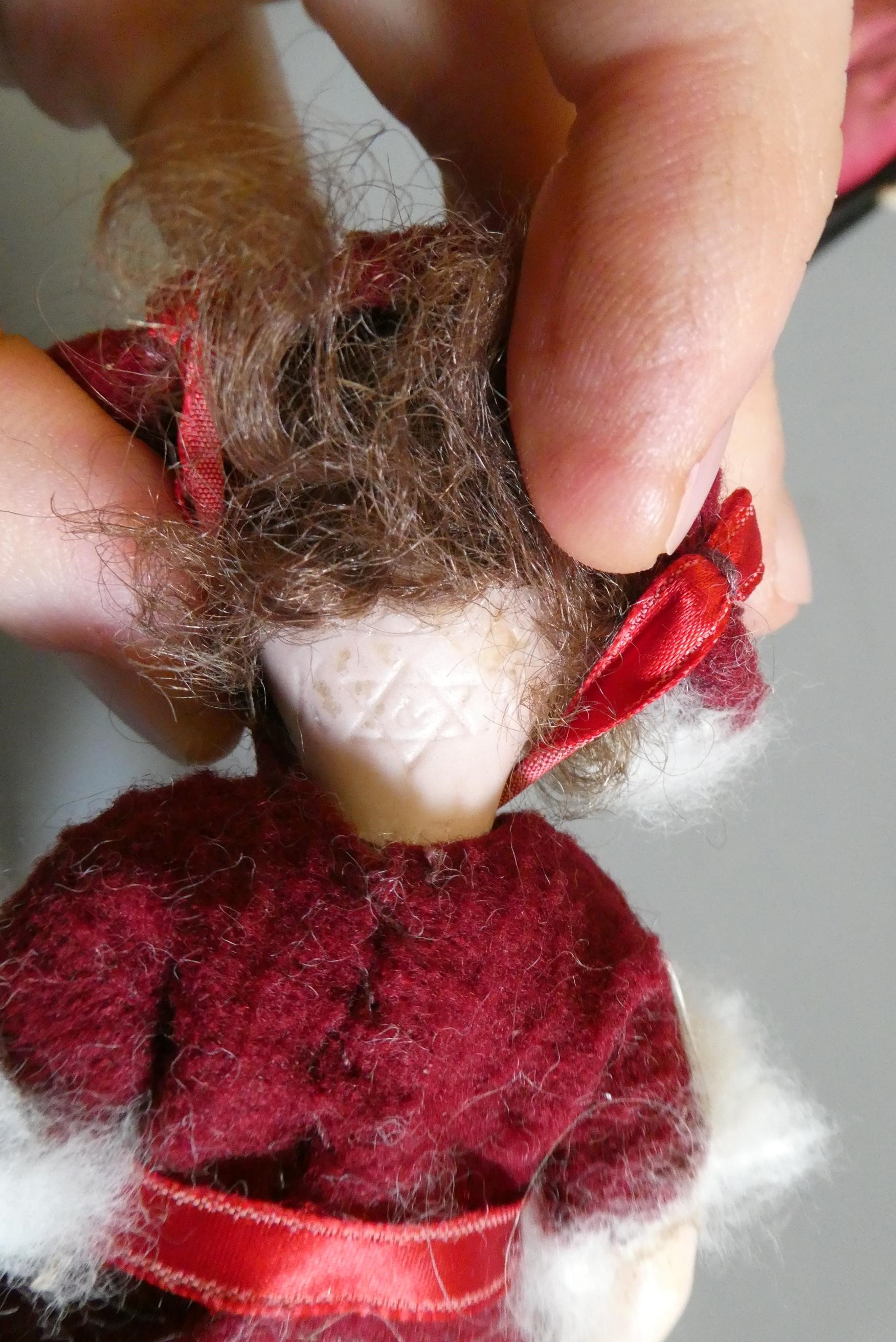 Three small bisque socket head dolls Image