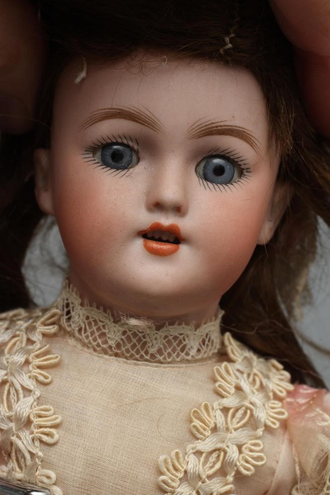 A Simon & Halbig bisque socket head doll Image