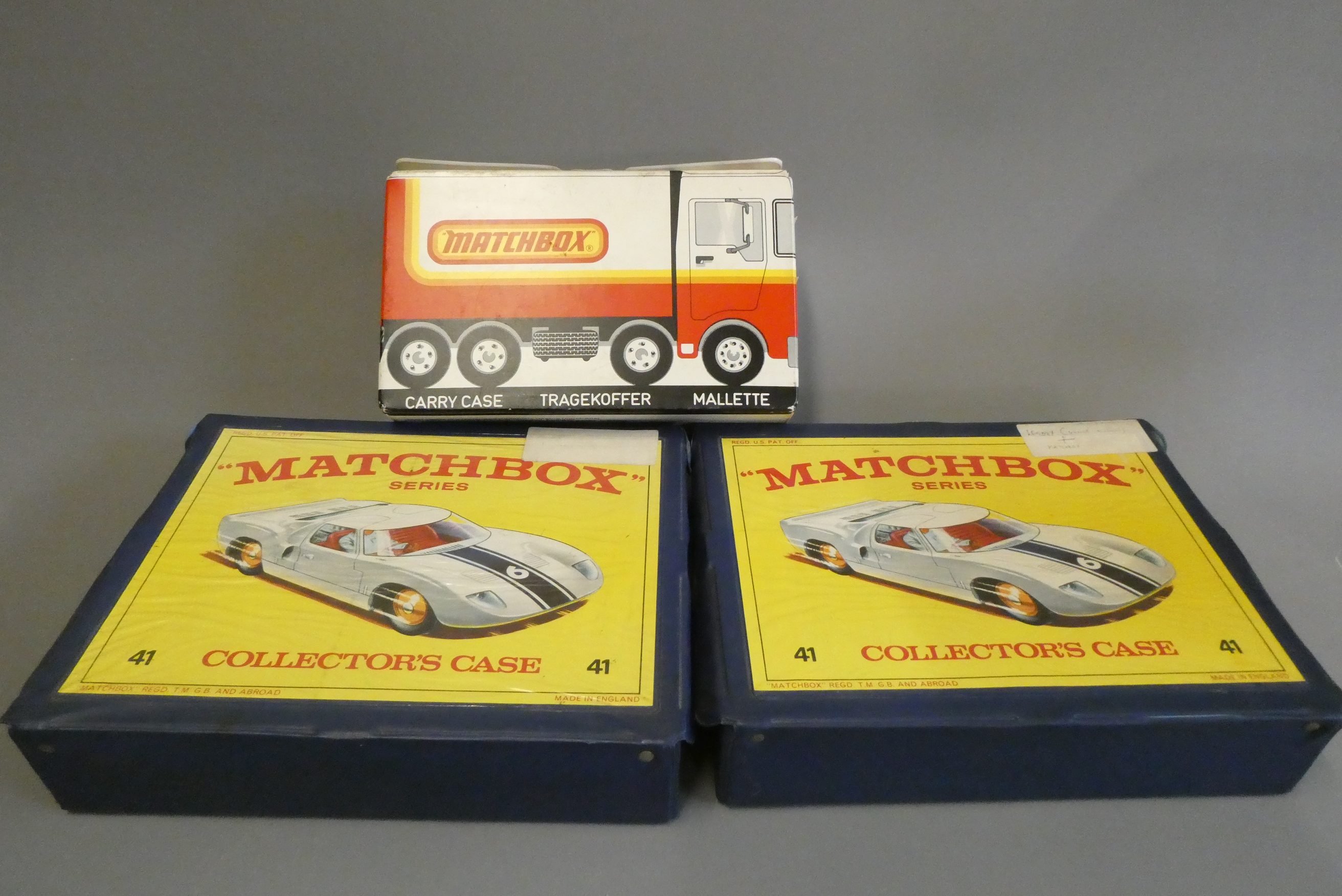 Three Matchbox plastic carry cases with internal trays, carry handles broken/missing and some age Image