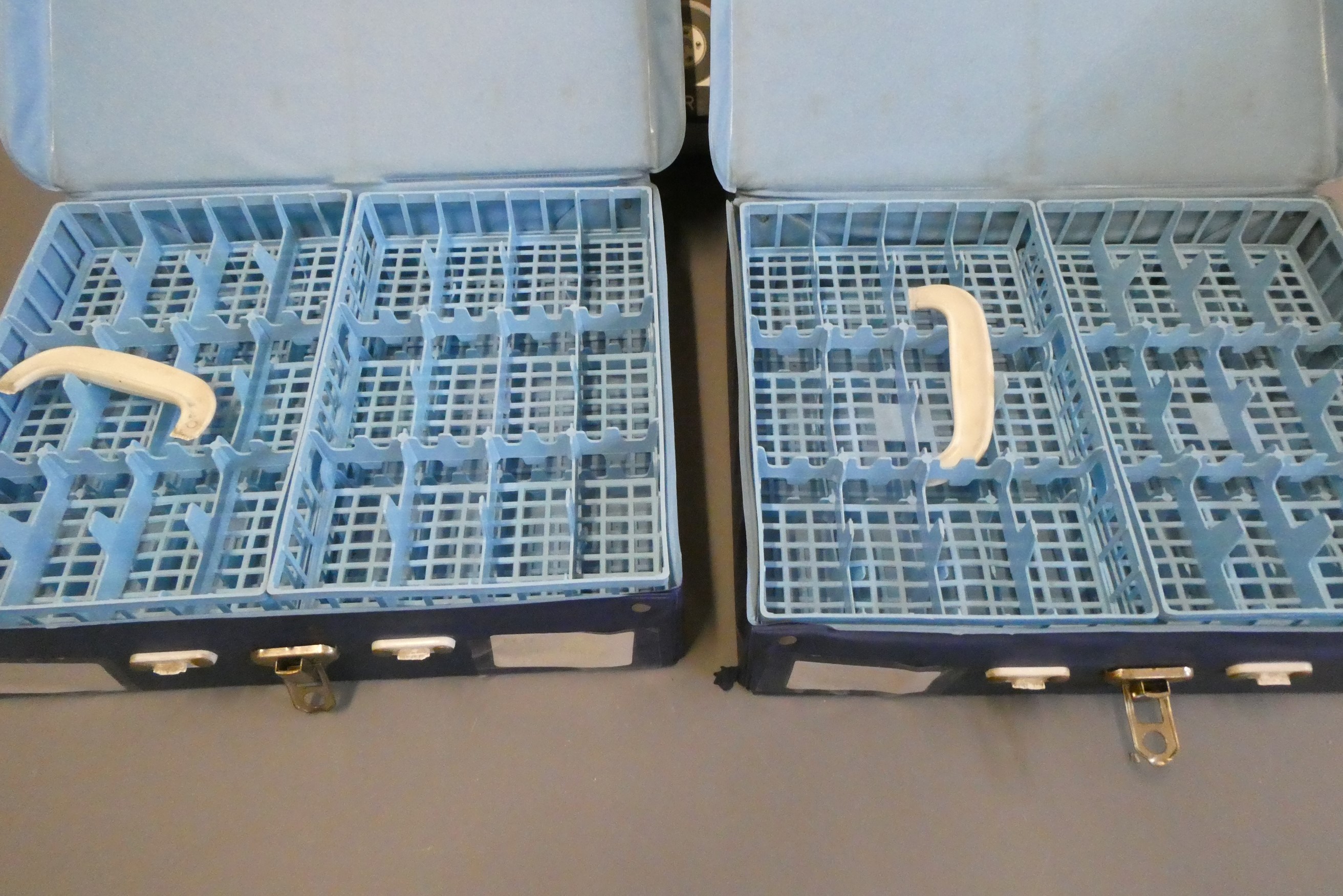 Three Matchbox plastic carry cases with internal trays, carry handles broken/missing and some age Image