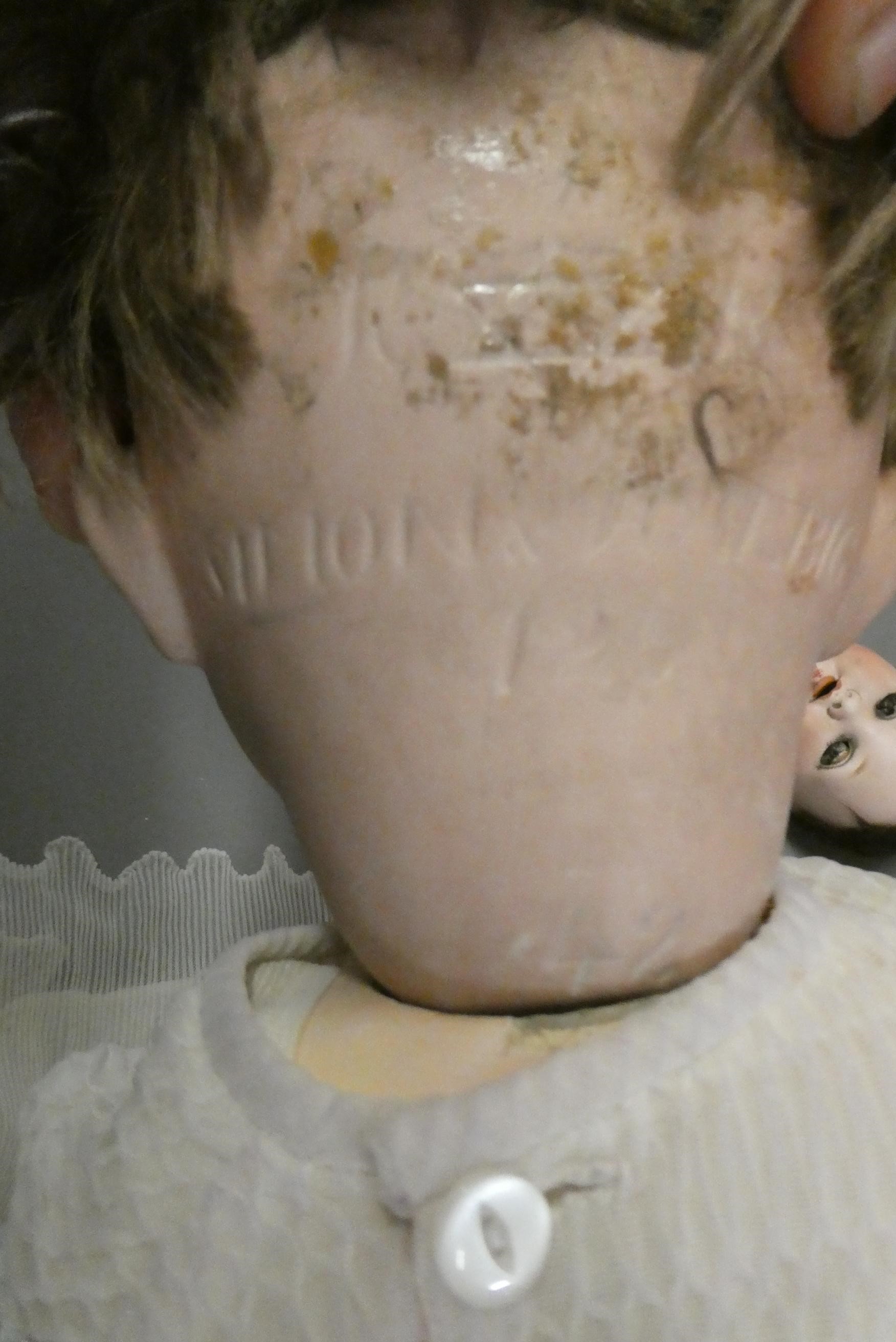 Two bisque socket head dolls Image