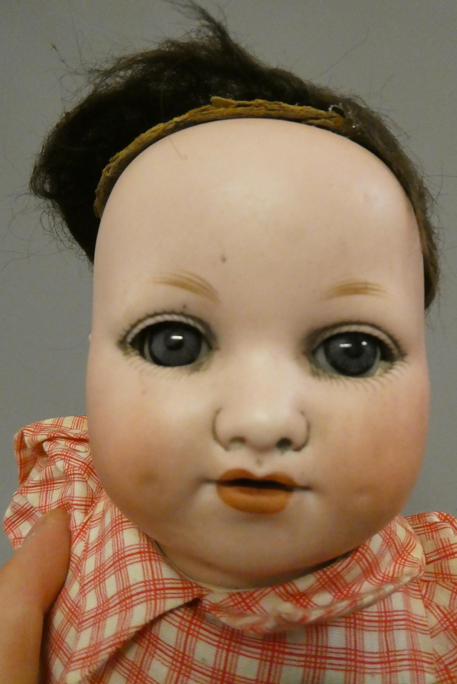 Two bisque socket head dolls Image