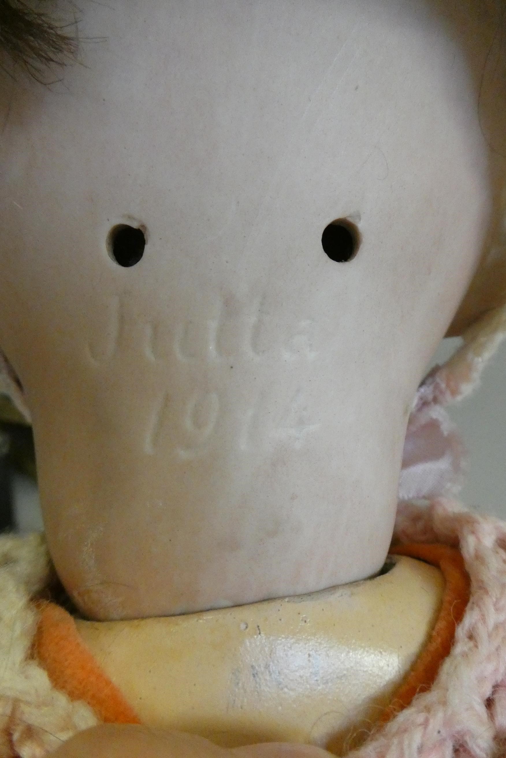 A Jutta bisque socket head doll with blue glass sleeping eyes Image
