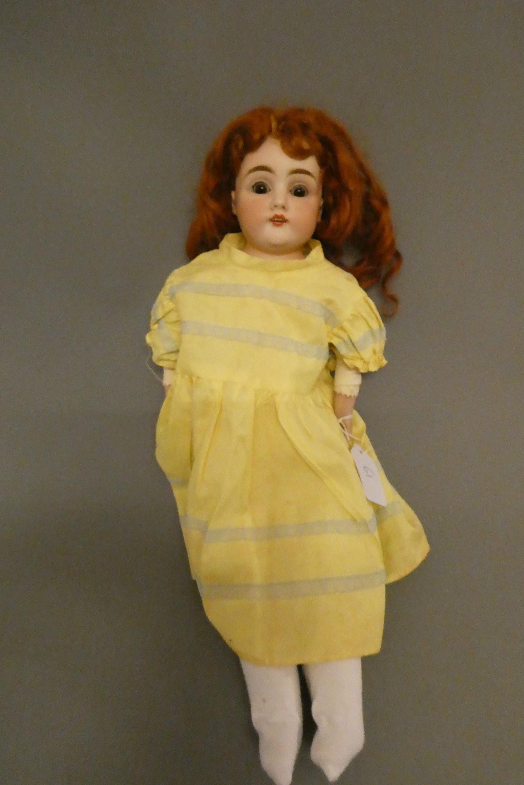 A Kestner bisque shoulder head doll Image