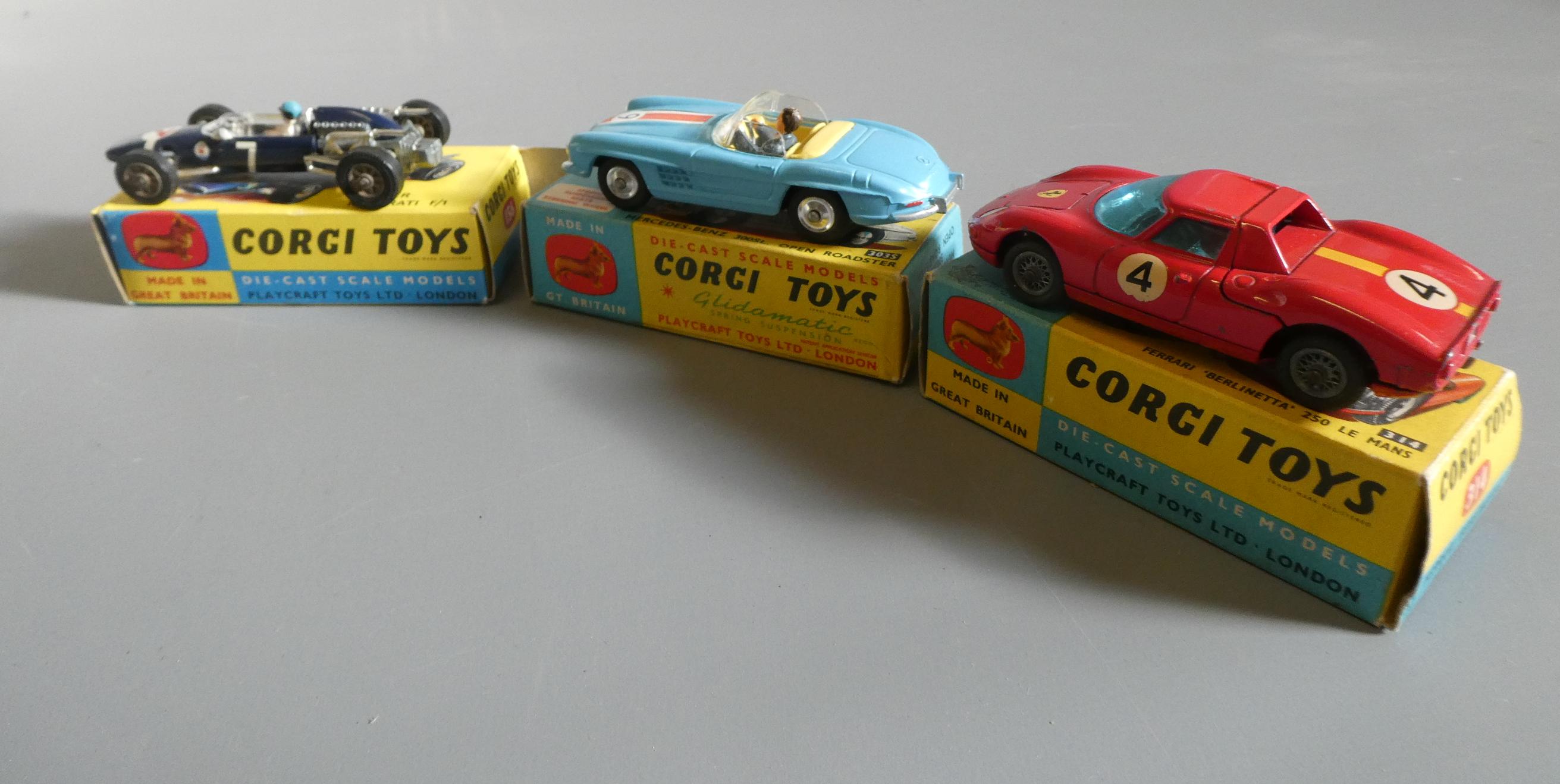 Three Corgi vehicles comprising 156 Cooper race car, 303s Mercedes 300SL and Ferrari 250 LM, boxes Image