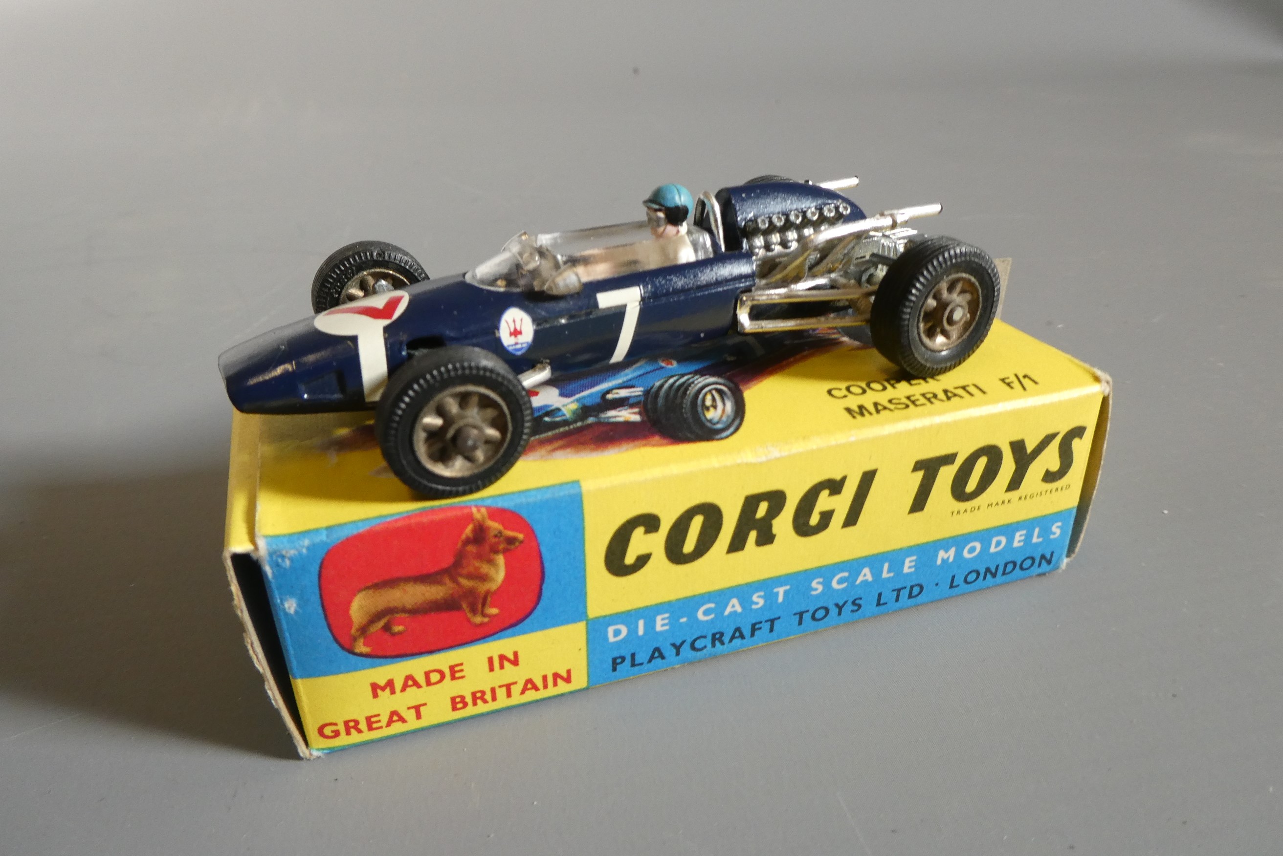 Three Corgi vehicles comprising 156 Cooper race car, 303s Mercedes 300SL and Ferrari 250 LM, boxes Image