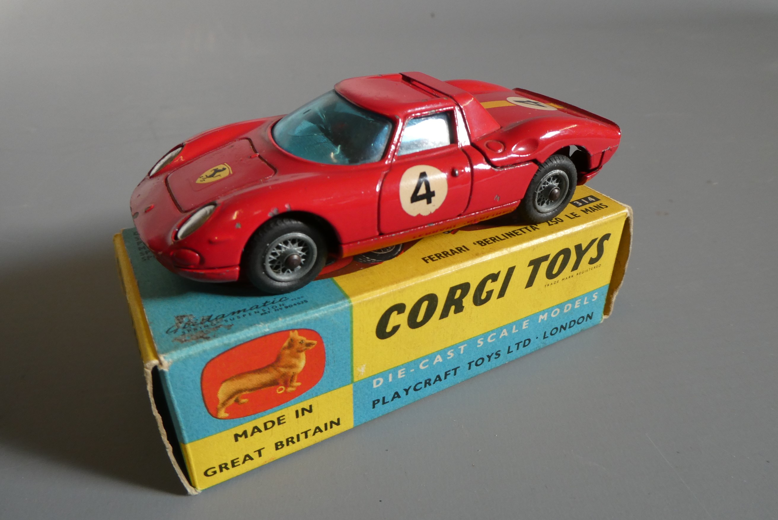 Three Corgi vehicles comprising 156 Cooper race car, 303s Mercedes 300SL and Ferrari 250 LM, boxes Image