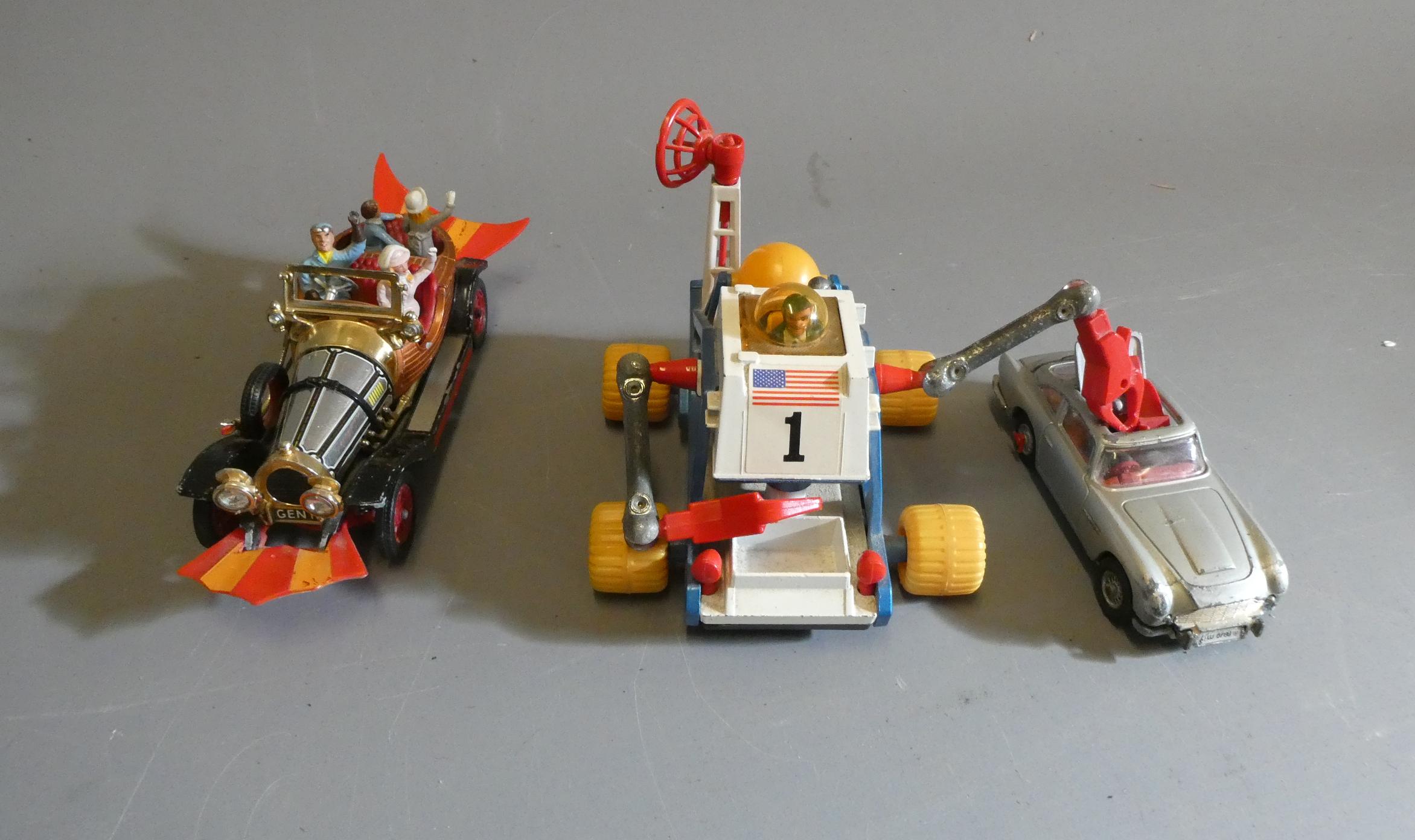 Three unboxed Corgi vehicles comprising Chitty Chitty Bang Bang, James Bond DB5, and Moon Raker Image