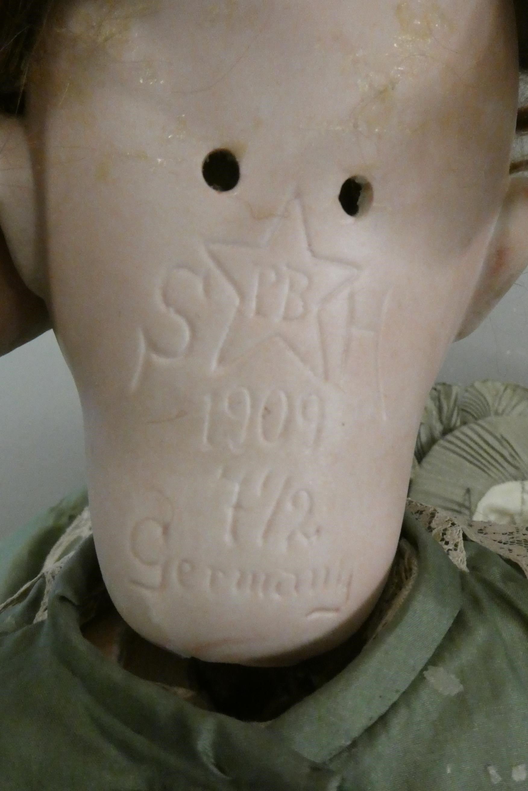 A Schoenau & Hoffmeister bisque socket head doll Image