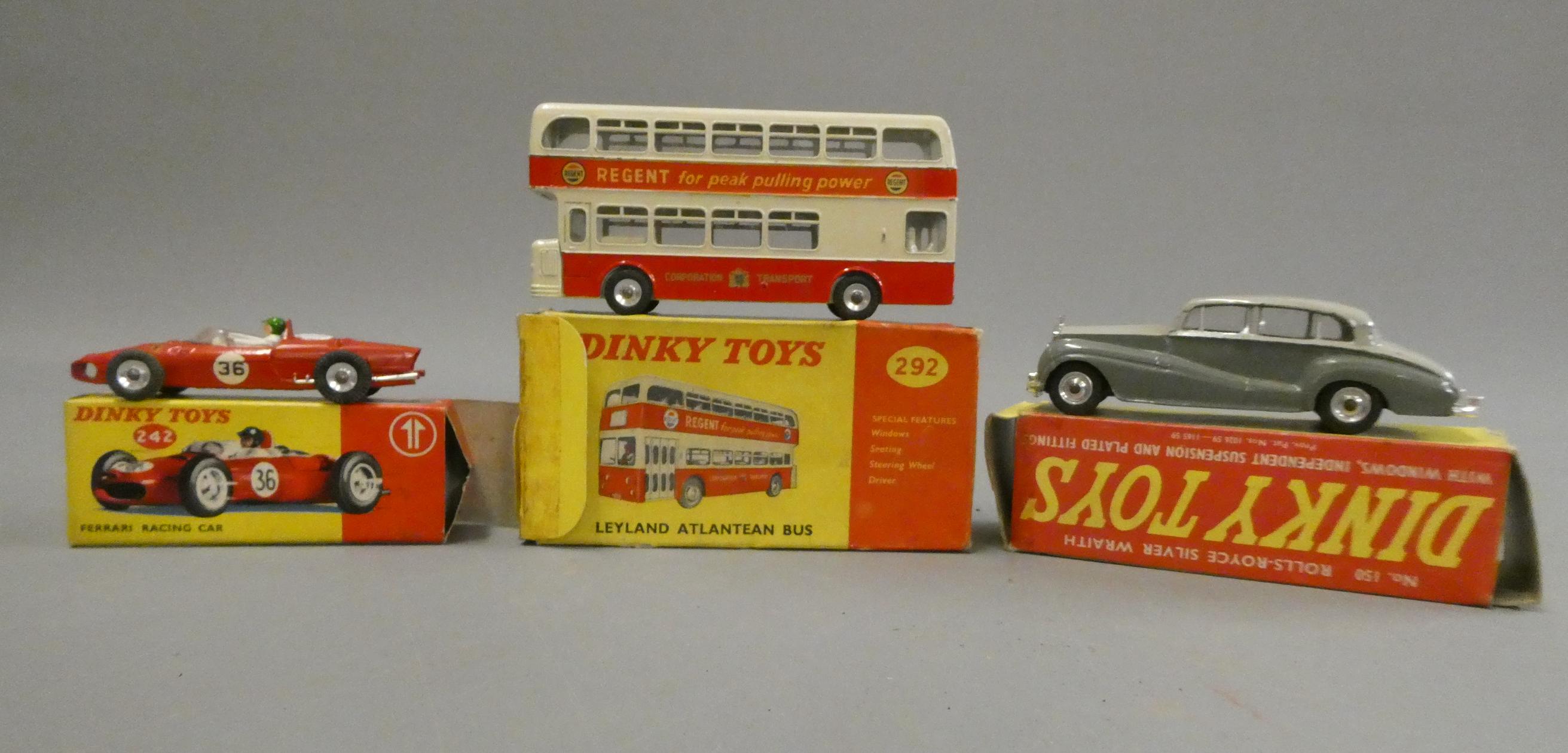 Dinky Toys 242 Ferrari race car, 150 Rolls Royce Silver Wraith and 292 Leyland Atlantean bus, boxes Image