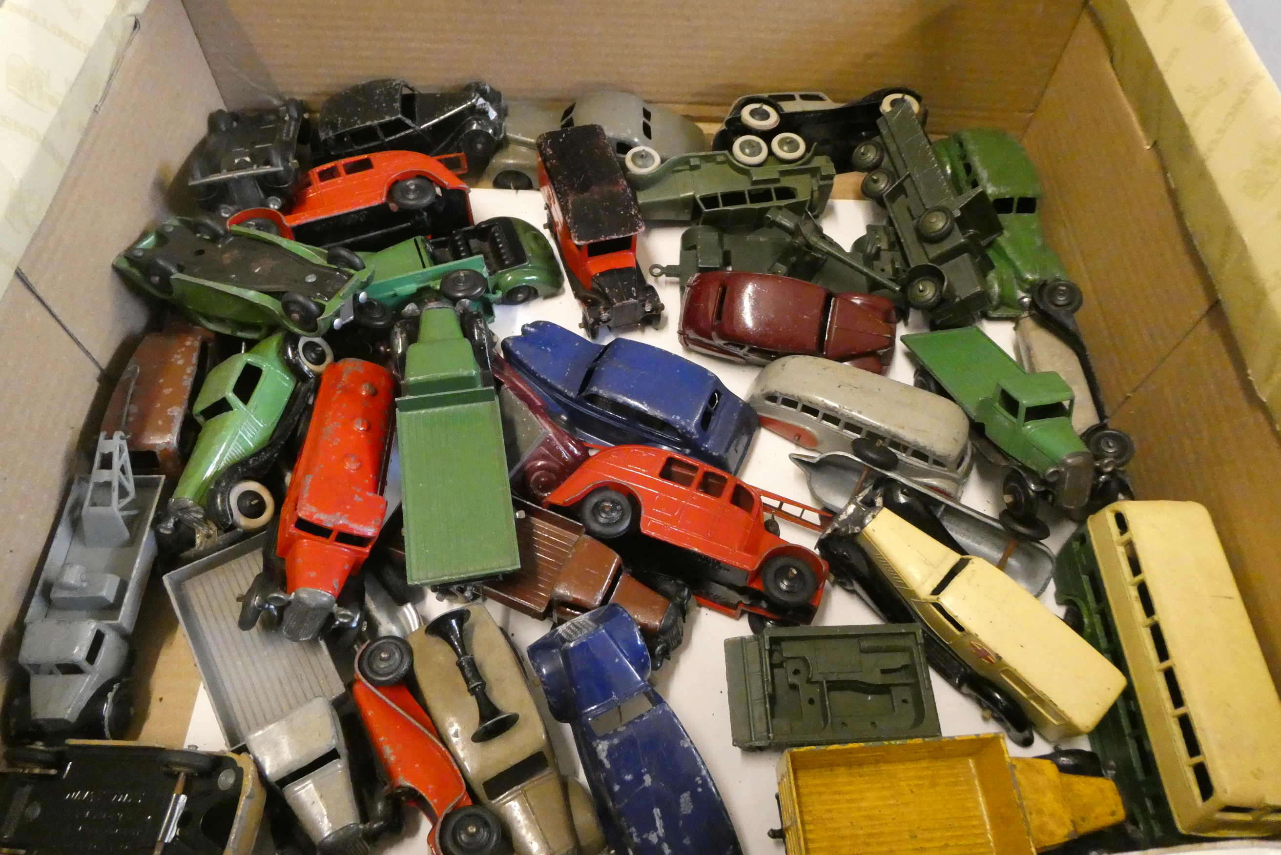 Unboxed early Dinky vehicles including saloon cars trucks and 6 wheeled army saloon, fair to poor Image