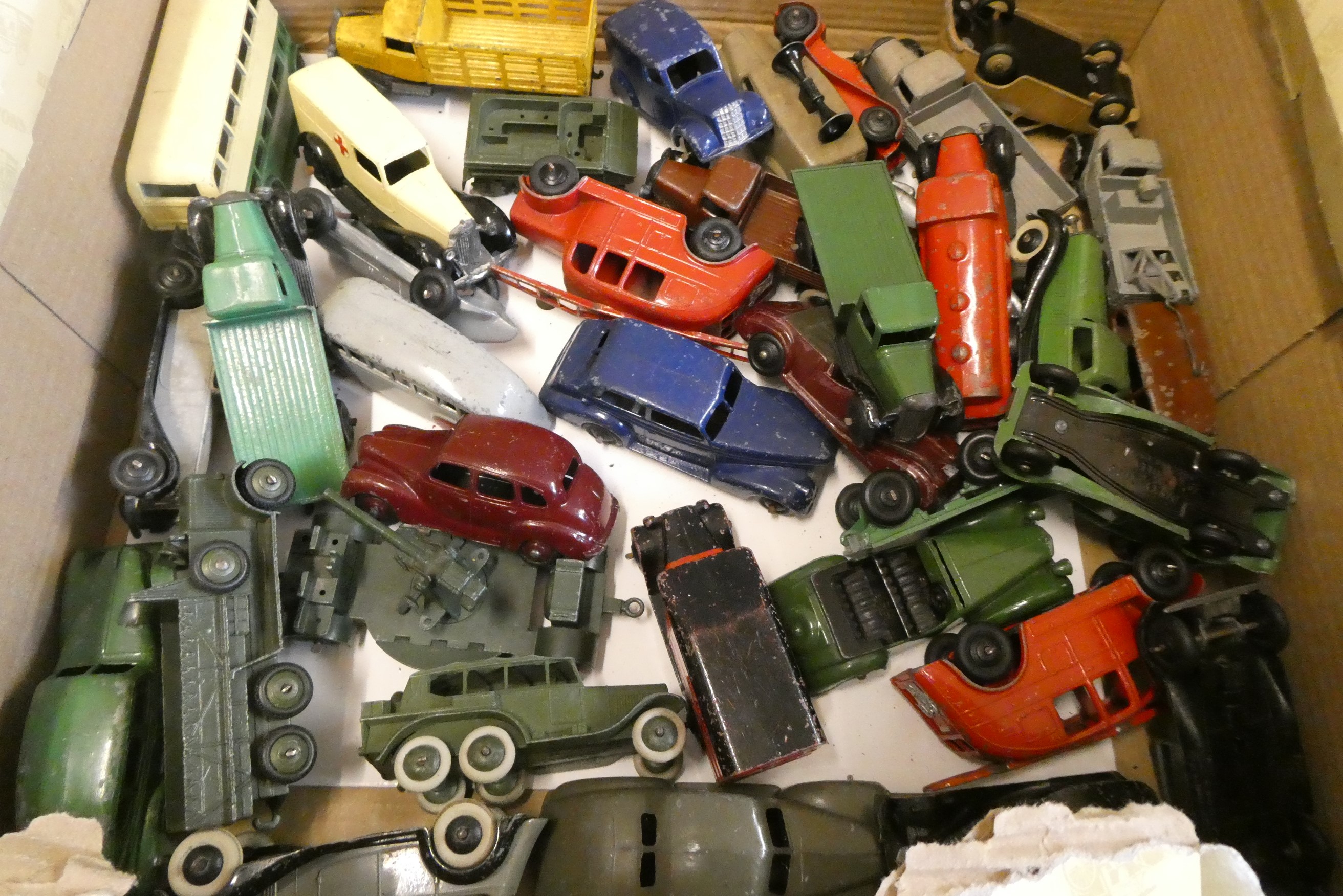 Unboxed early Dinky vehicles including saloon cars trucks and 6 wheeled army saloon, fair to poor Image
