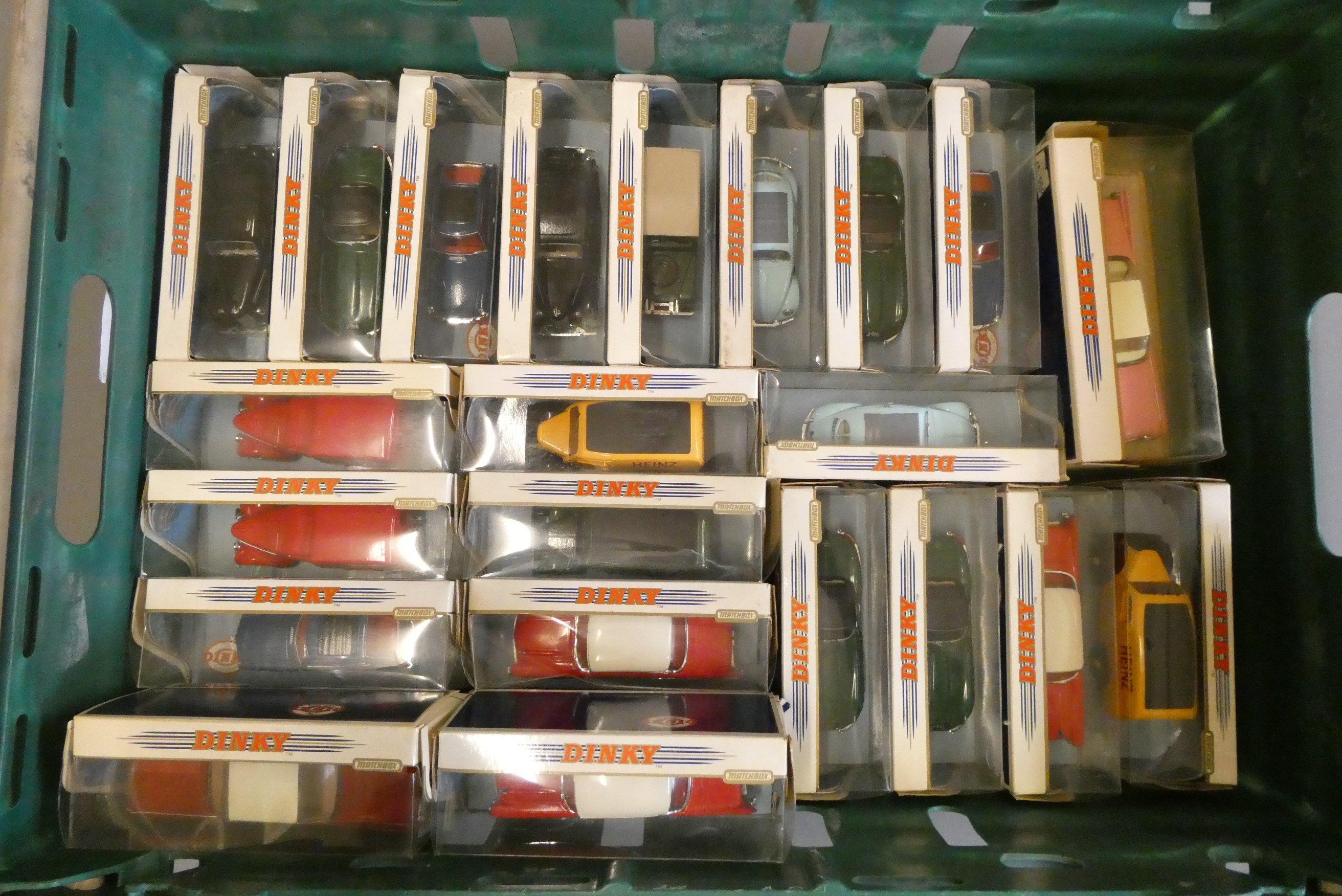 Twenty-two late issue Dinky vehicles in display boxes including British and American cars and Image