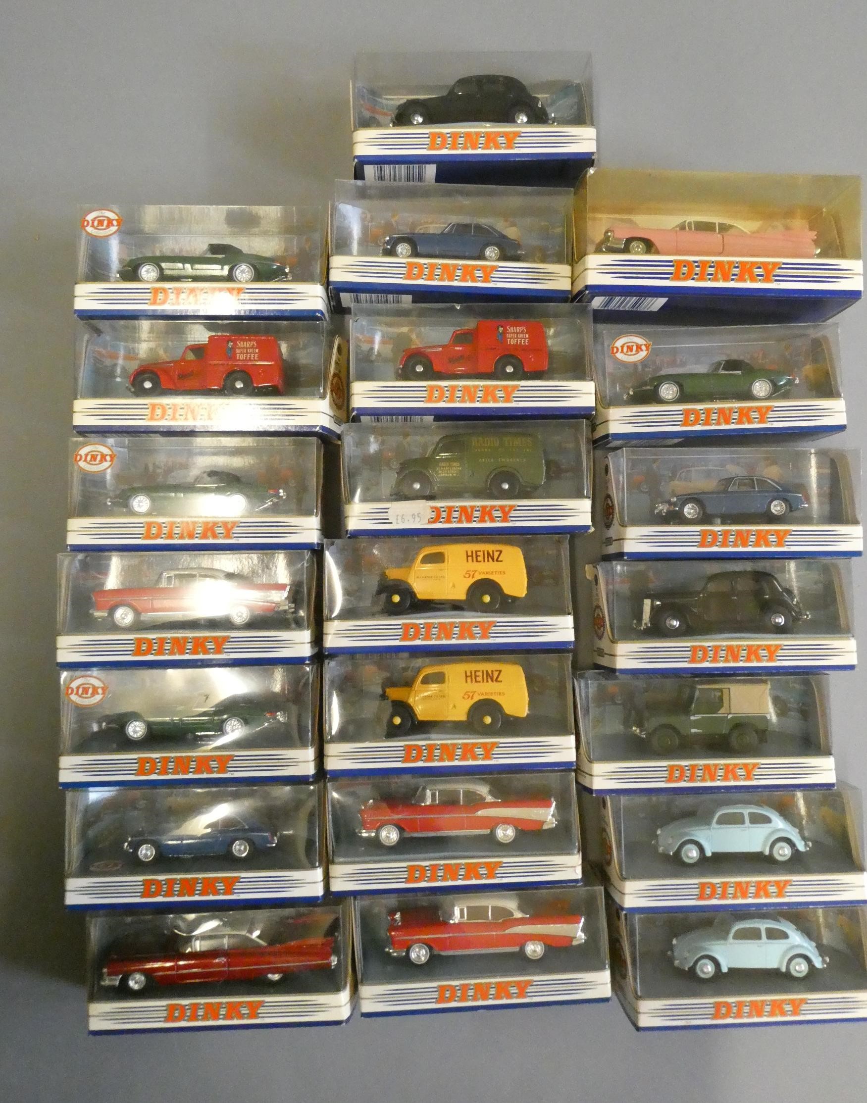 Twenty-two late issue Dinky vehicles in display boxes including British and American cars and Image