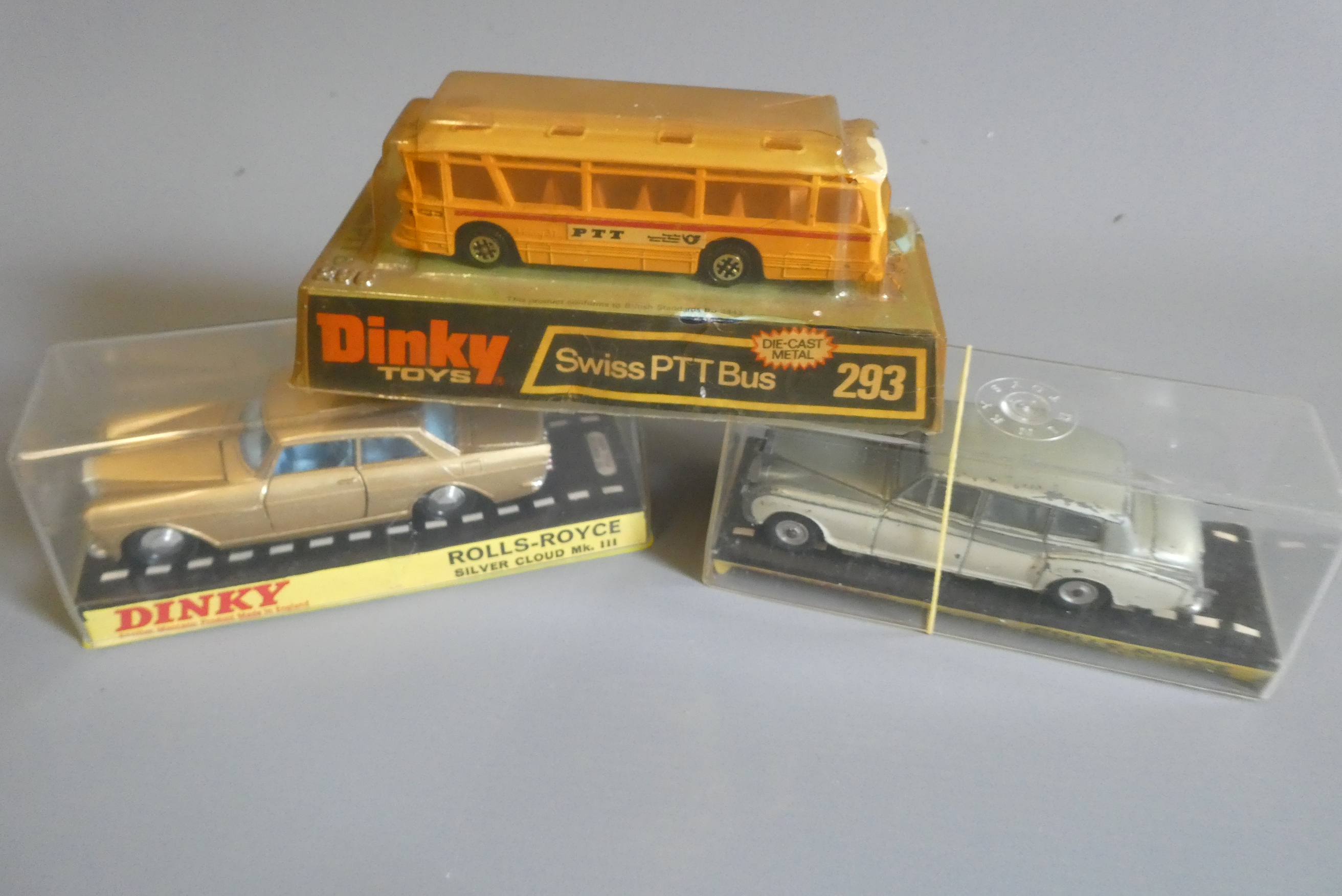Three Dinky cars comprising 127 Rolls Royce Silver Cloud, 152 Rolls Royce Phantom and 293 Swiss bus, Image