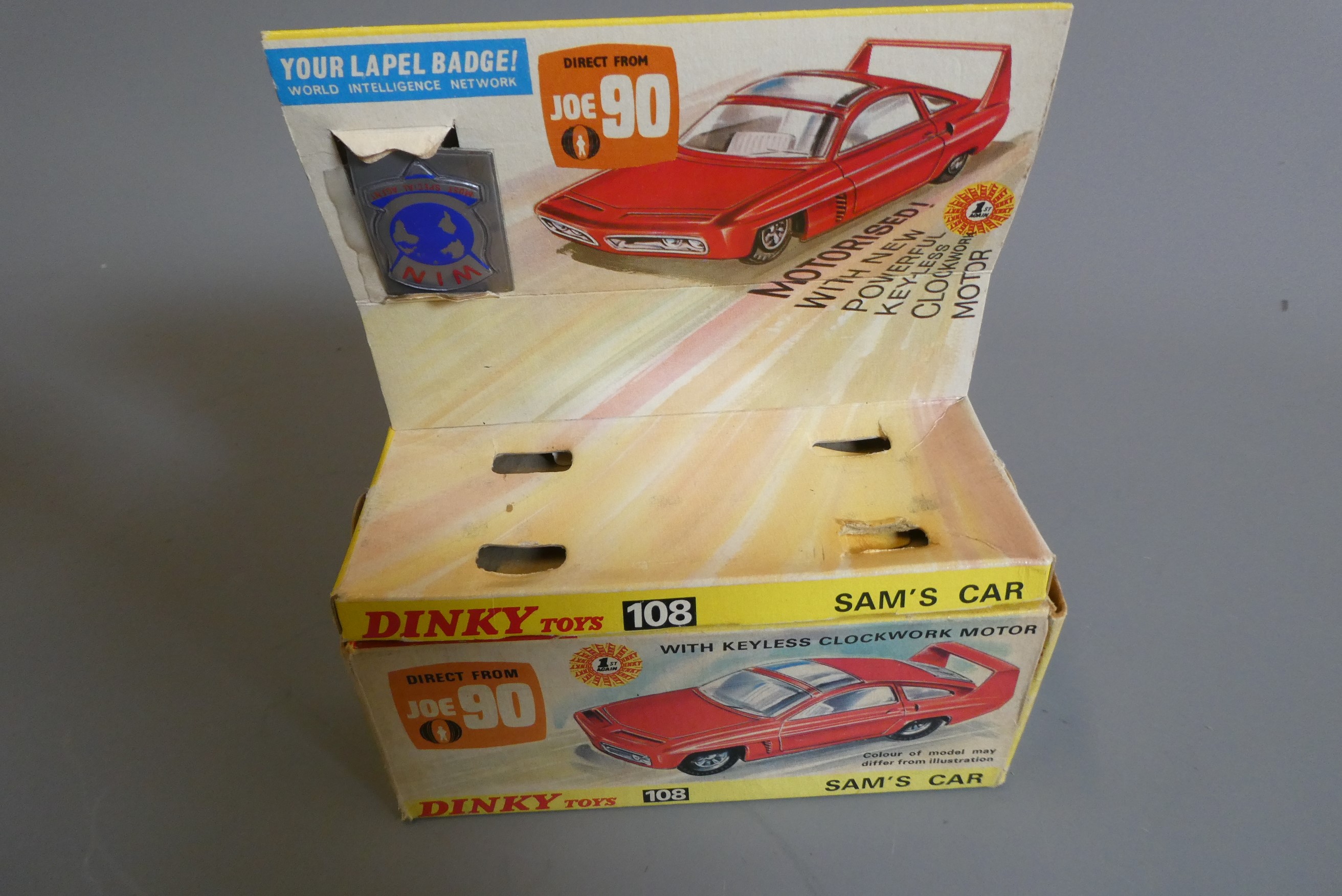 Dinky 108 Sam's Car finished in red with WIN badge (no instruction sheet), clockwork mechanism Image