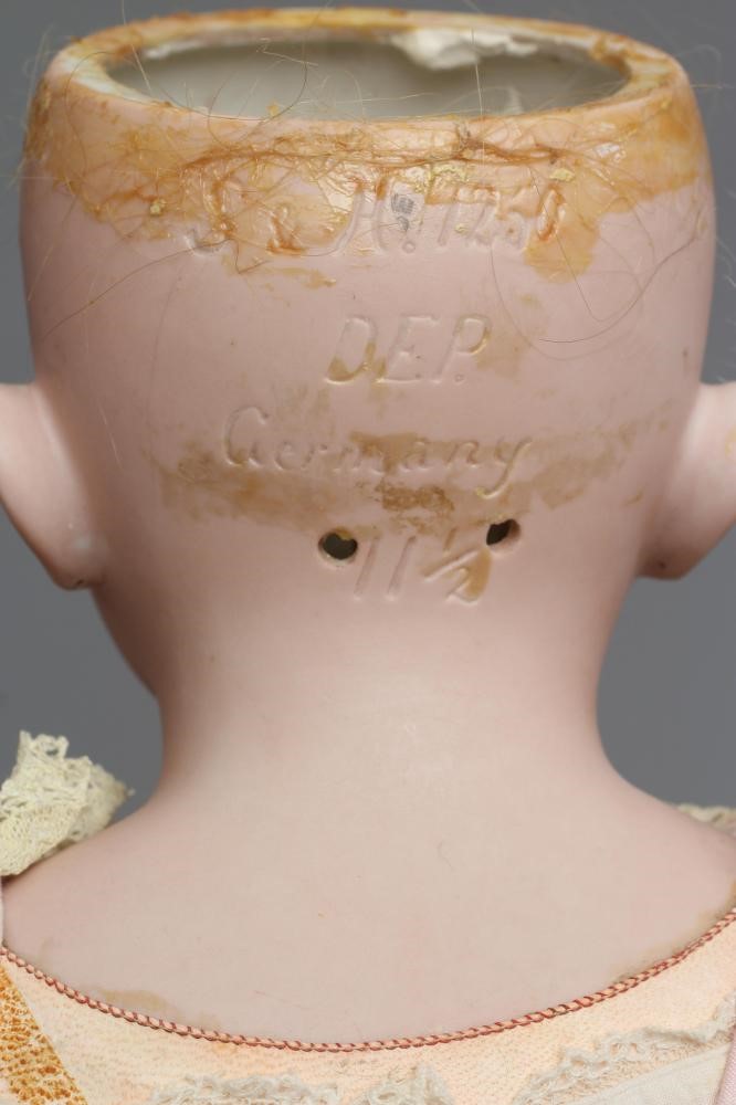 A Simon & Halbig bisque socket head doll Image