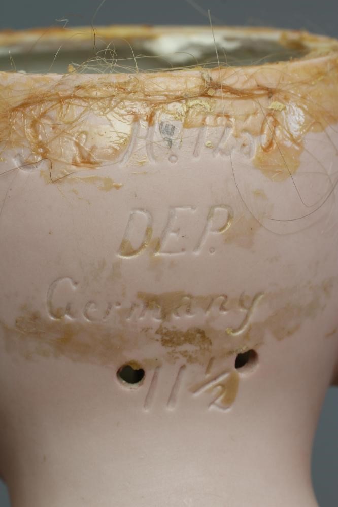 A Simon & Halbig bisque socket head doll Image